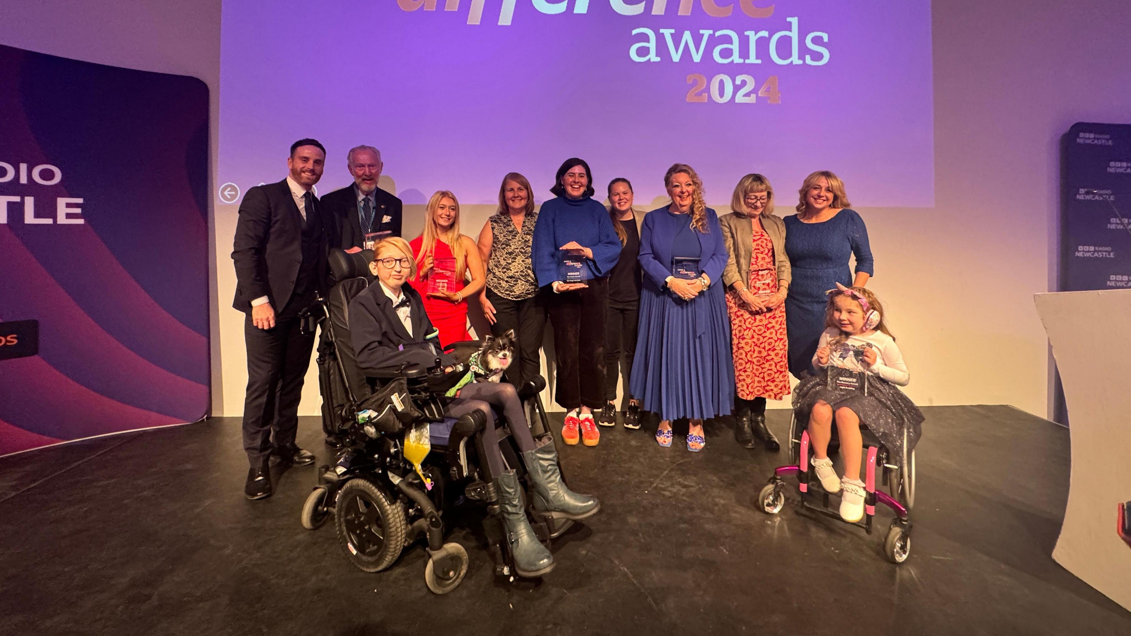 Matt Bailey and Anna Foster with the award winners on stage at the Baltic in Gateshead.