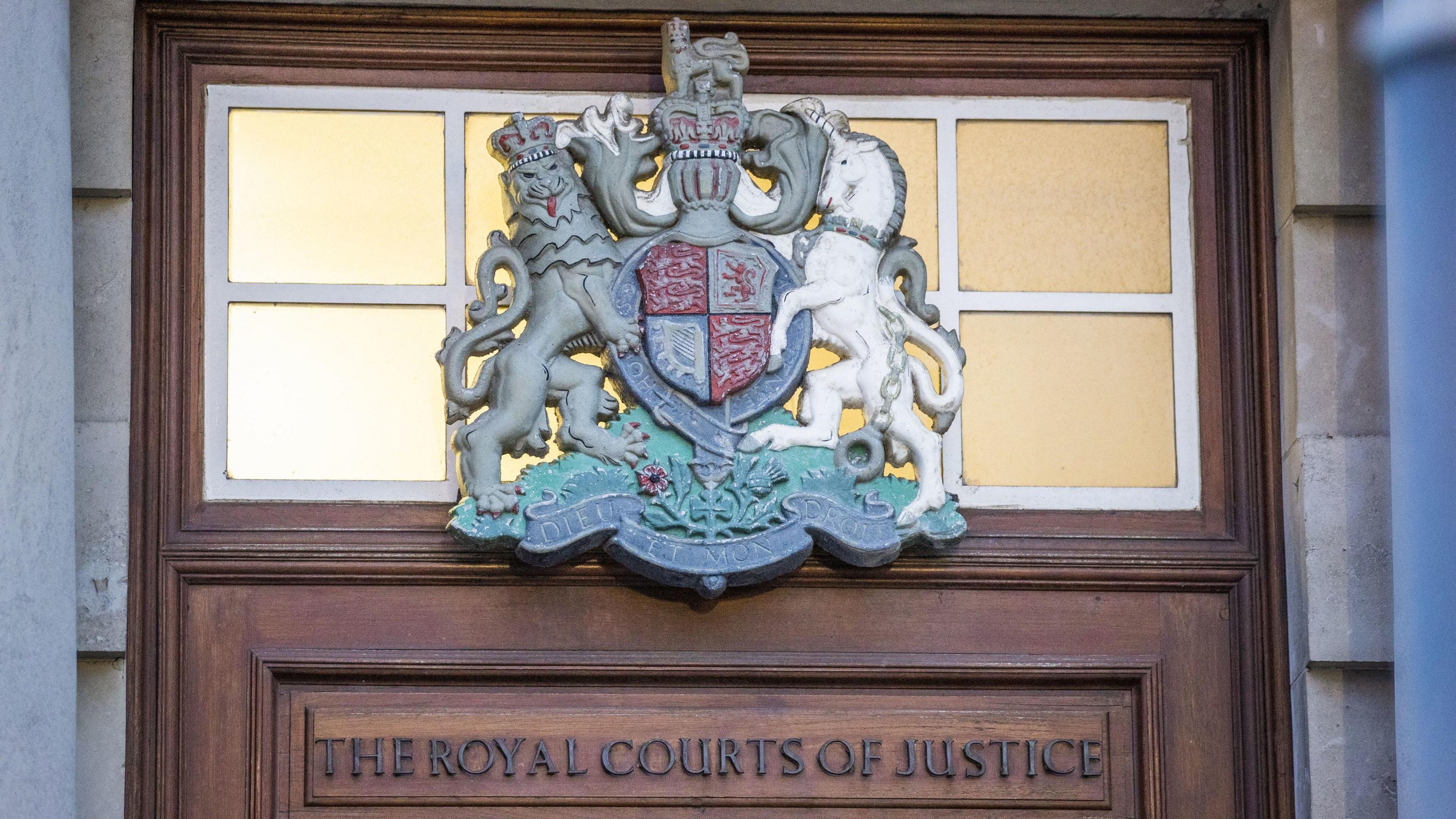 Royal Courts of Justice crest at Belfast High Court