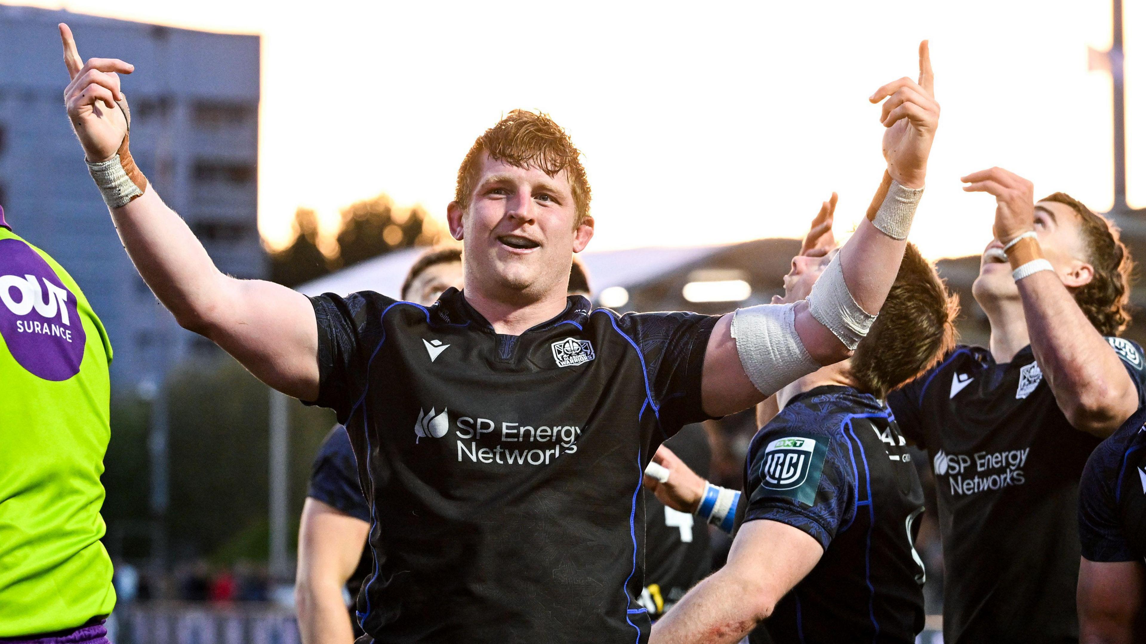 Johnny Matthews celebrates