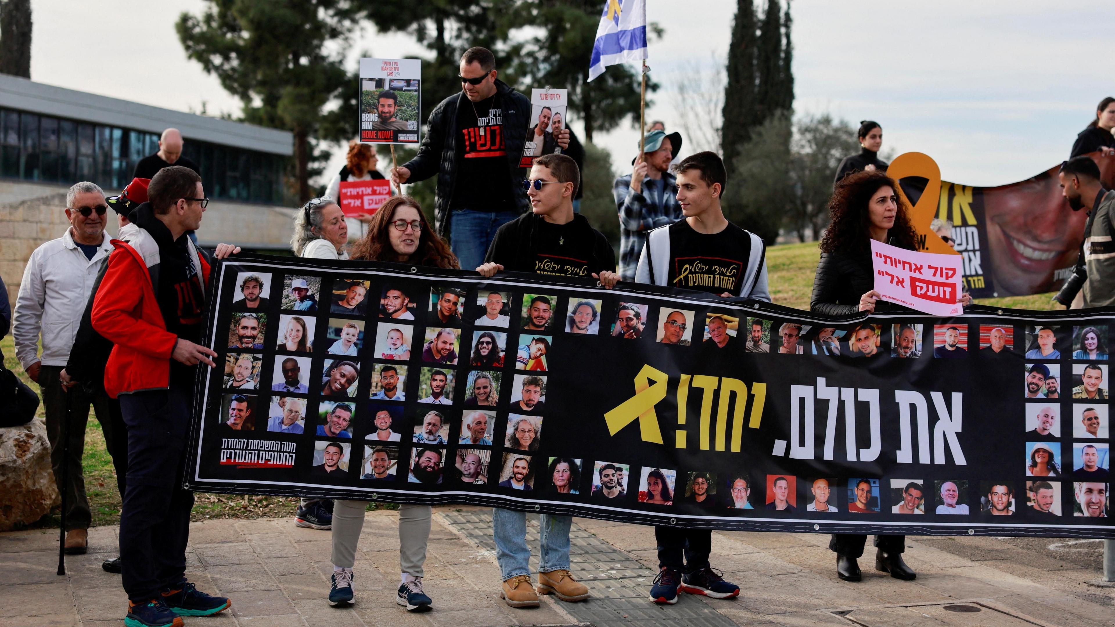 Israeli hostages' families and supporters hold a demonstration to demand the Israeli government agree a Gaza ceasefire and hostage release deal with Hamas, in Jerusalem (14 January 2025)