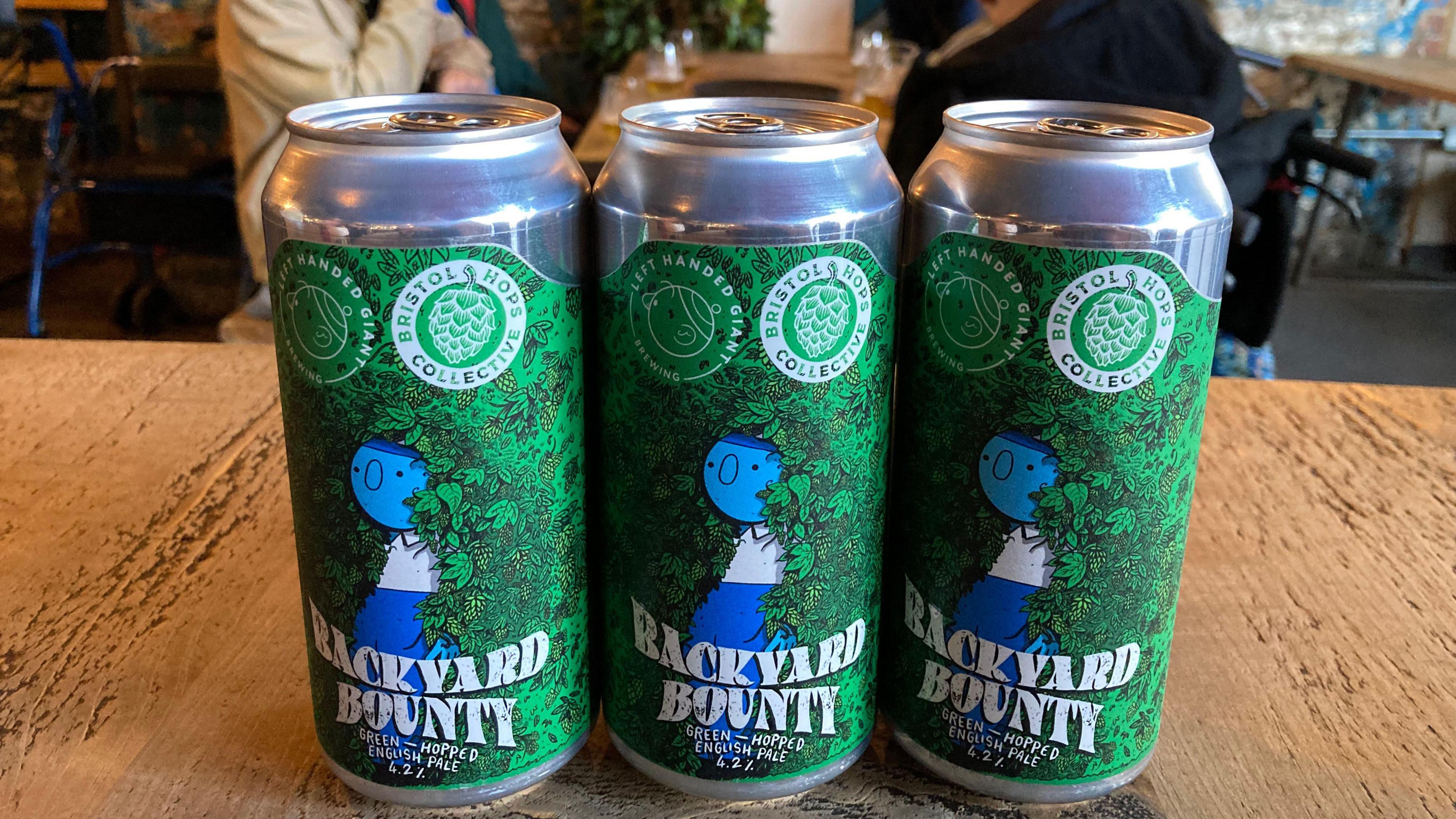 Cans of the beer that the care home residents made, called Backyard Bounty