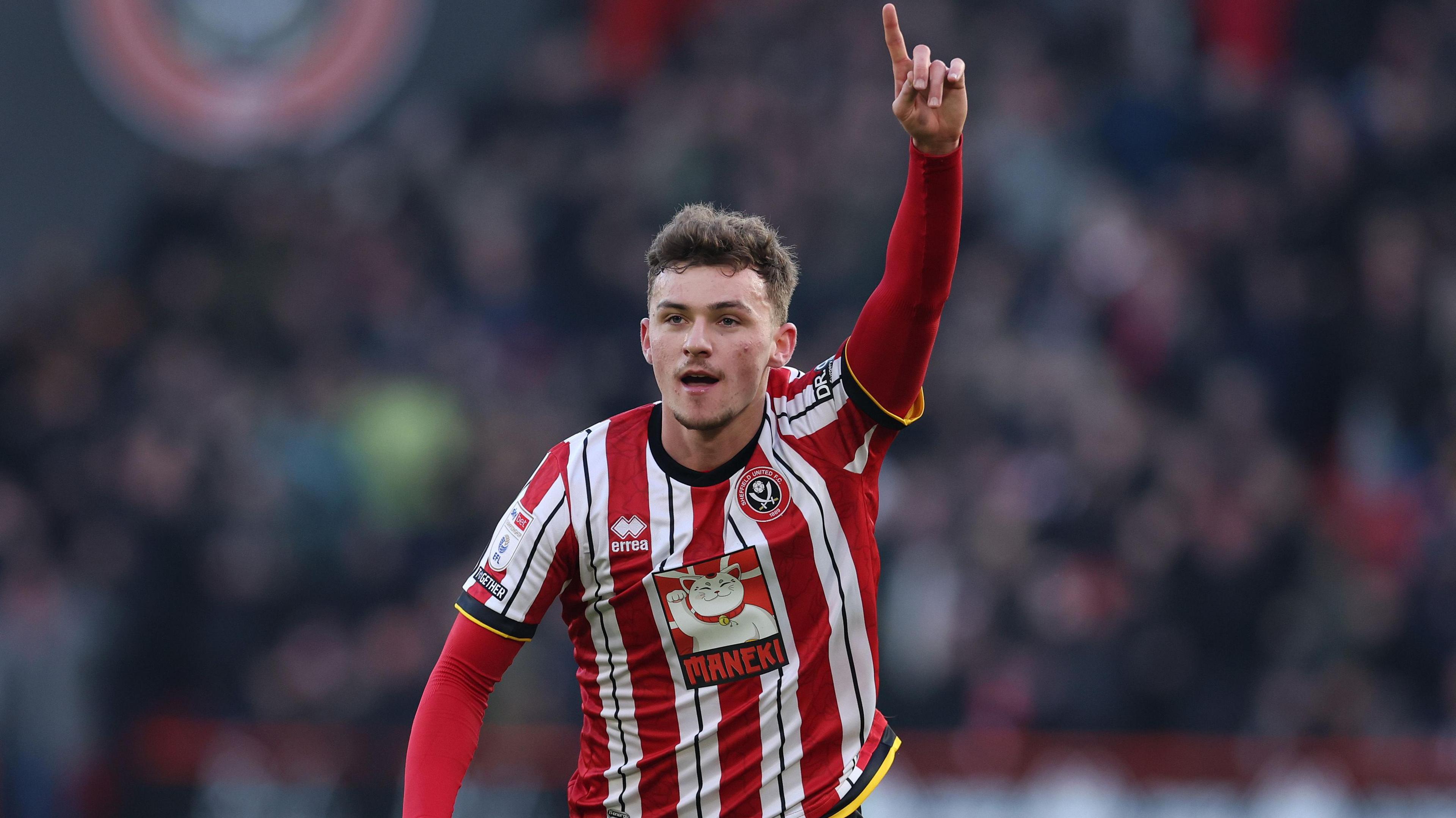 Harrison Burrows celebrates opening the scoring against Norwich 