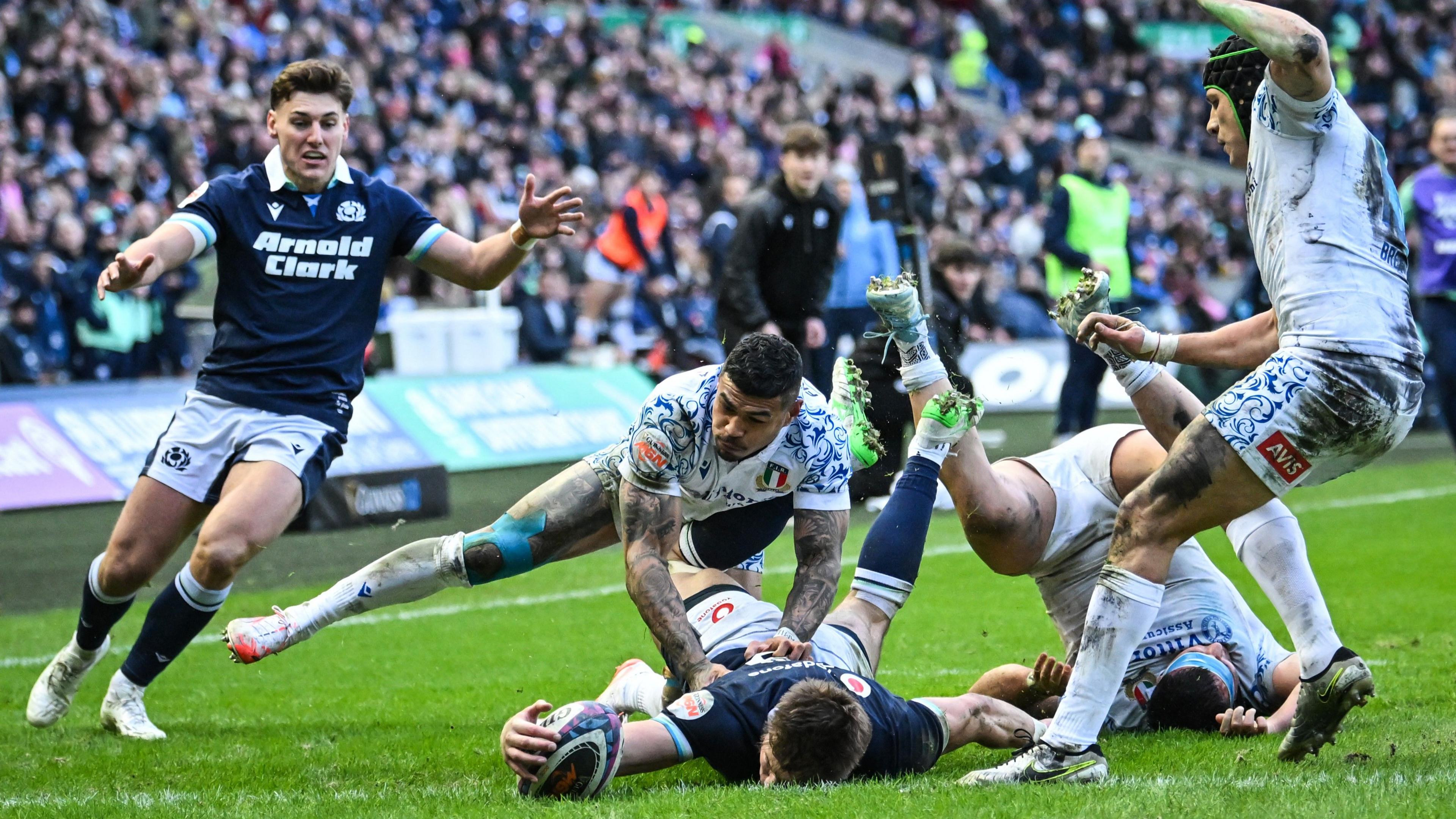 Huw Jones scored twice just after the hour to release the growing tension around Murrayfield