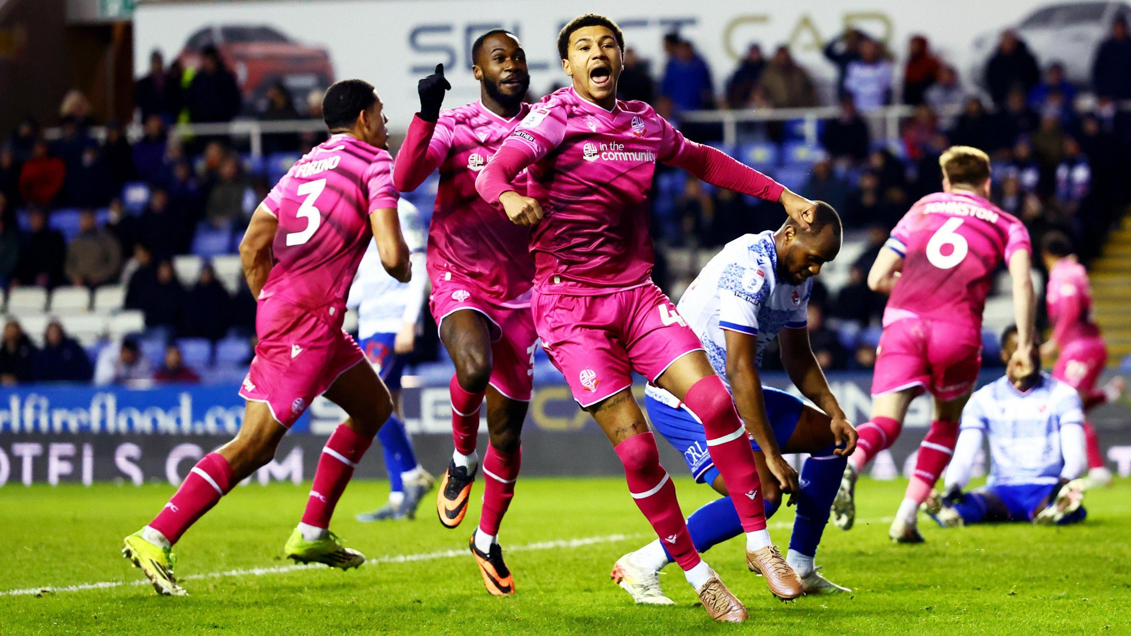 Mason Burstow celebrates after scoring a late equaliser for Bolton Wanderers