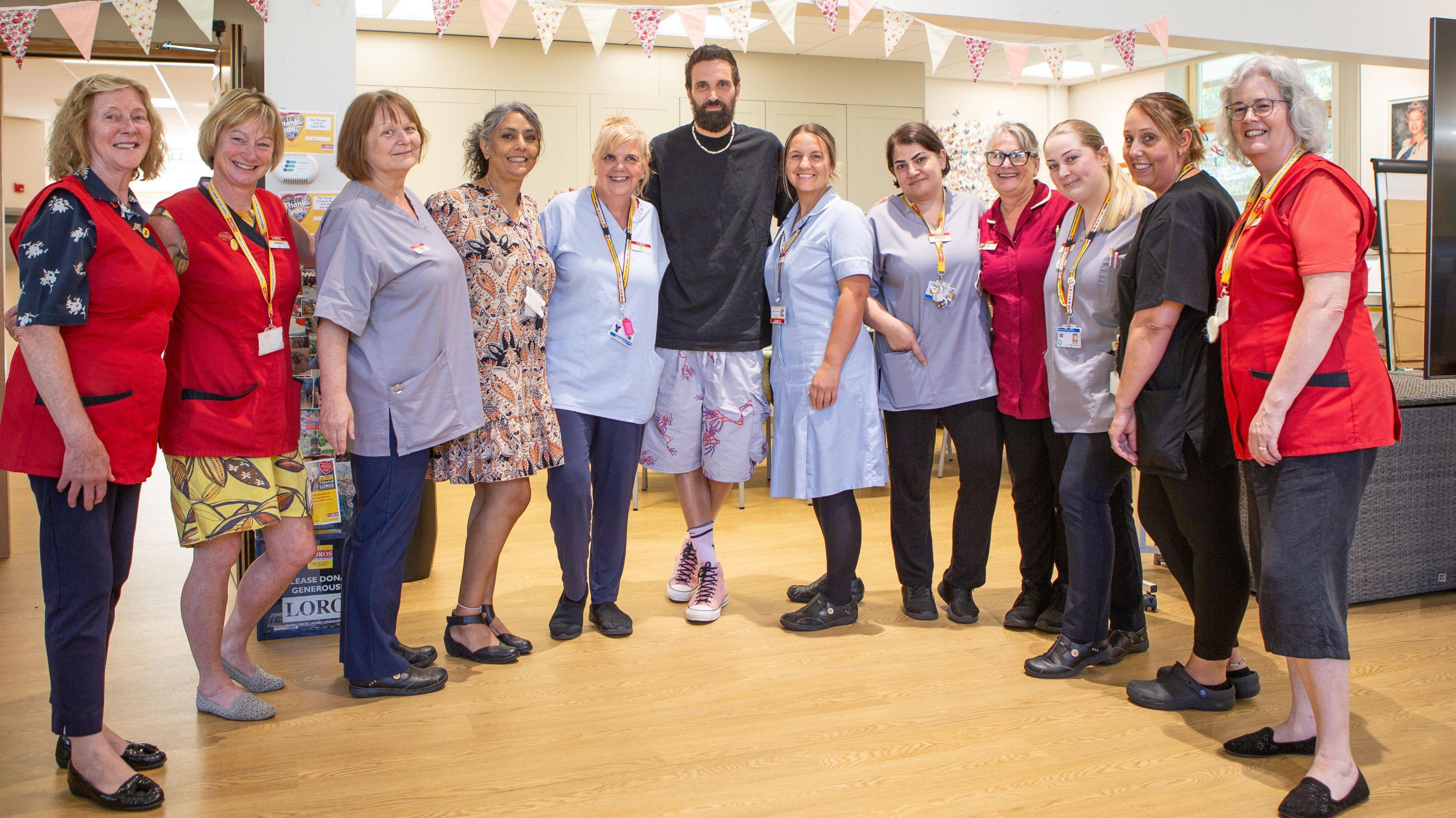Serge Pizzorno stood with 11 LOROS workers