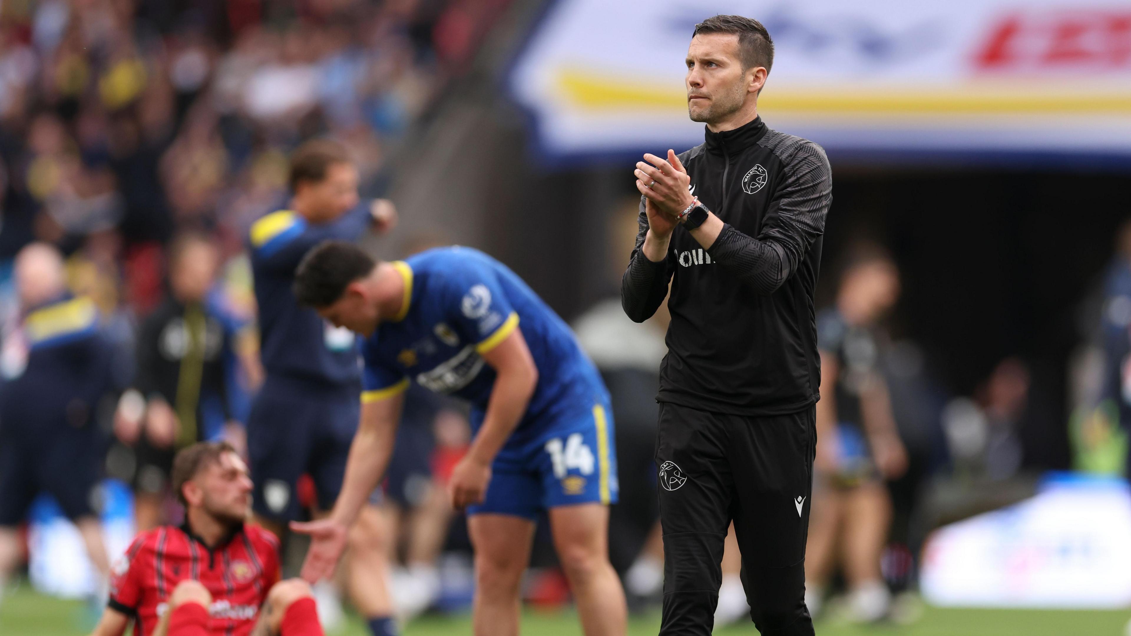 Walsall boss Mat Sadler looking dejected after losing to AFC Wimbledon in the League Two play-off final