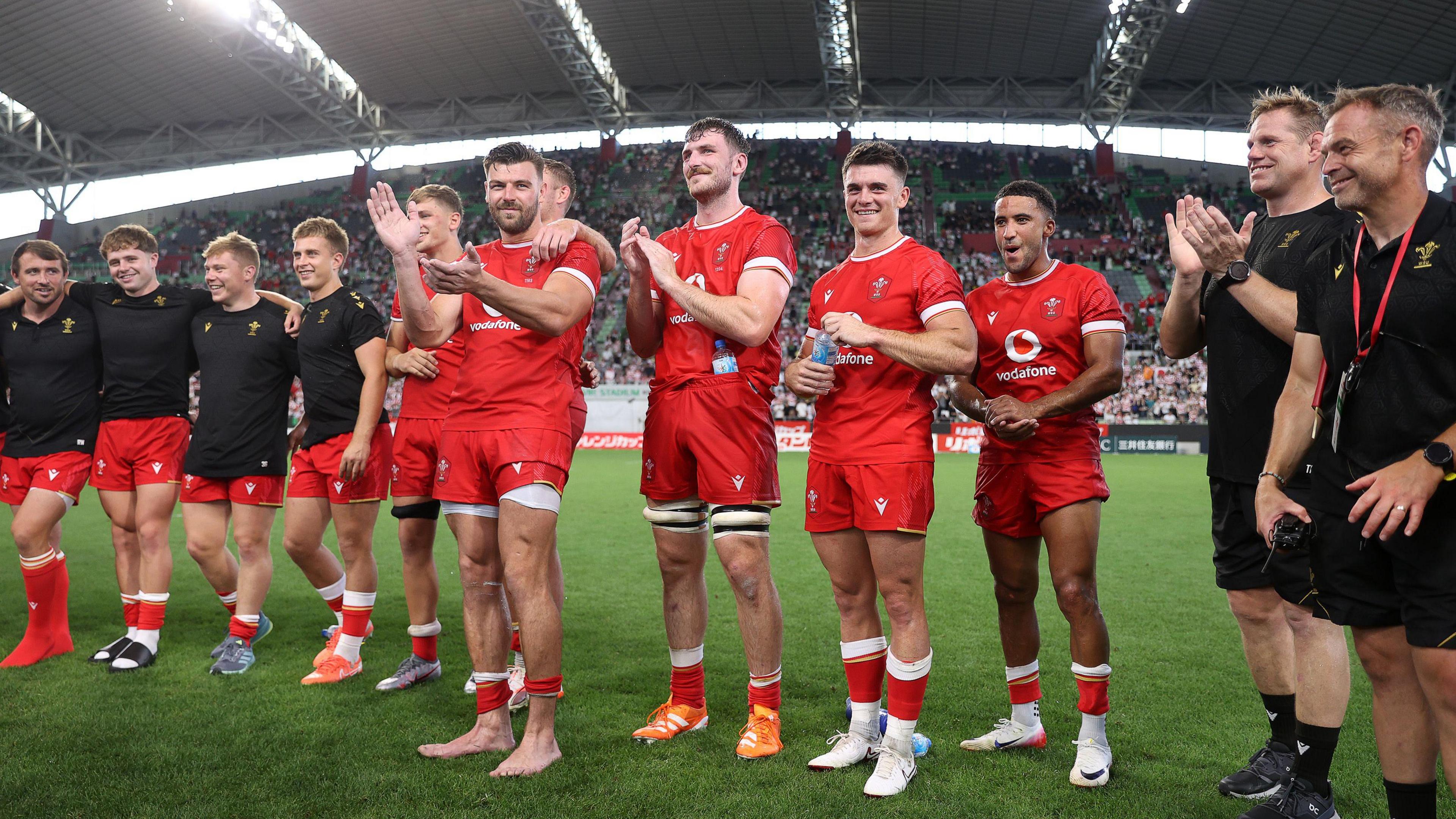 The Wales squad celebrate after beating Japan in the second Test in Kobe