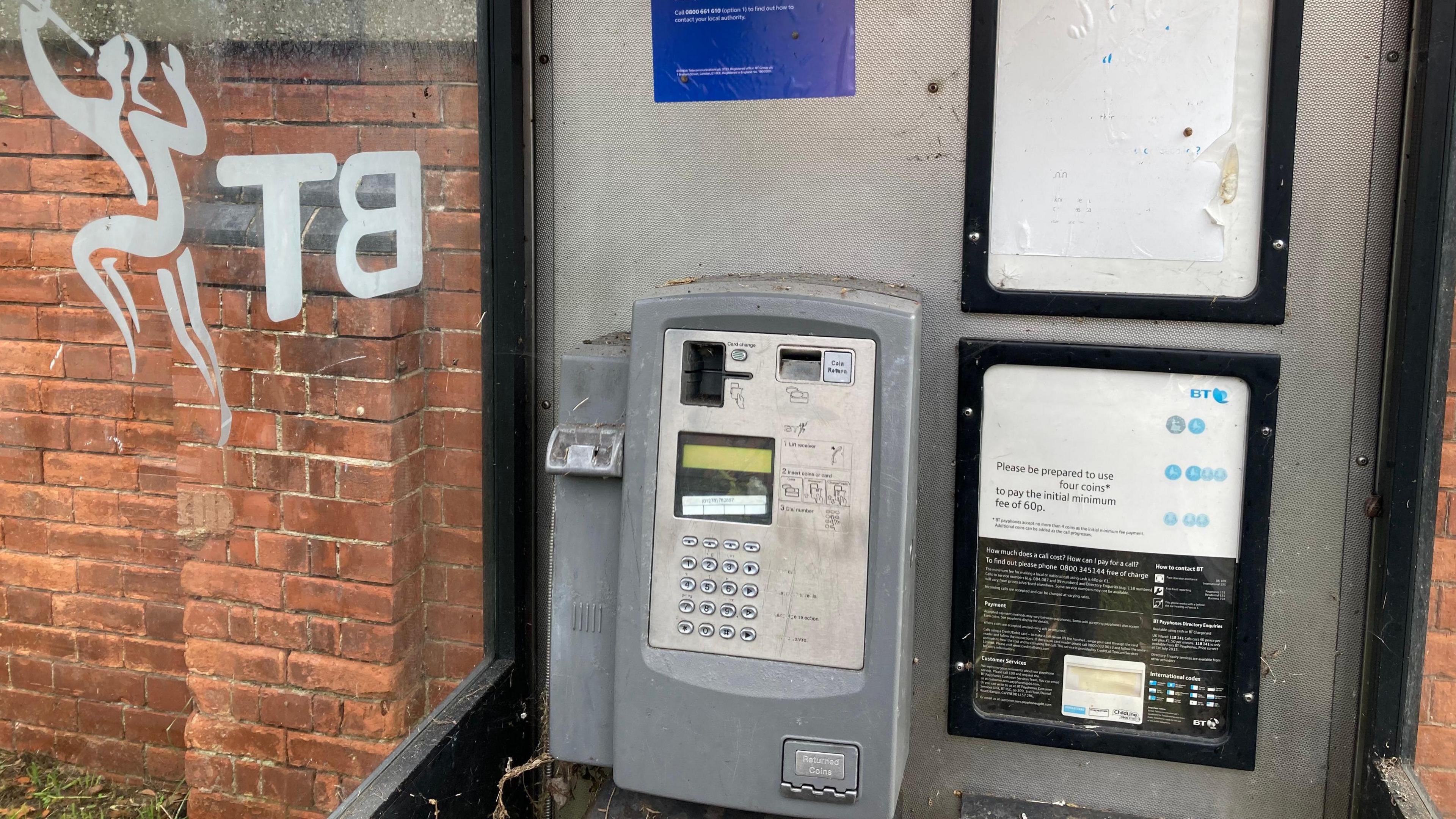 The inside of the phone box on Princess Street