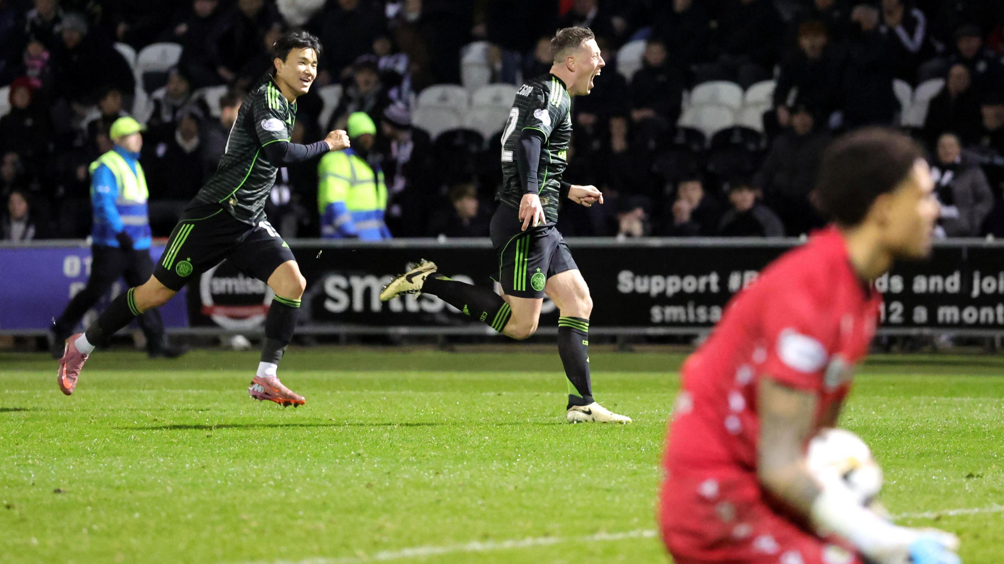 Callum McGregor celebrates scoring for Celtic