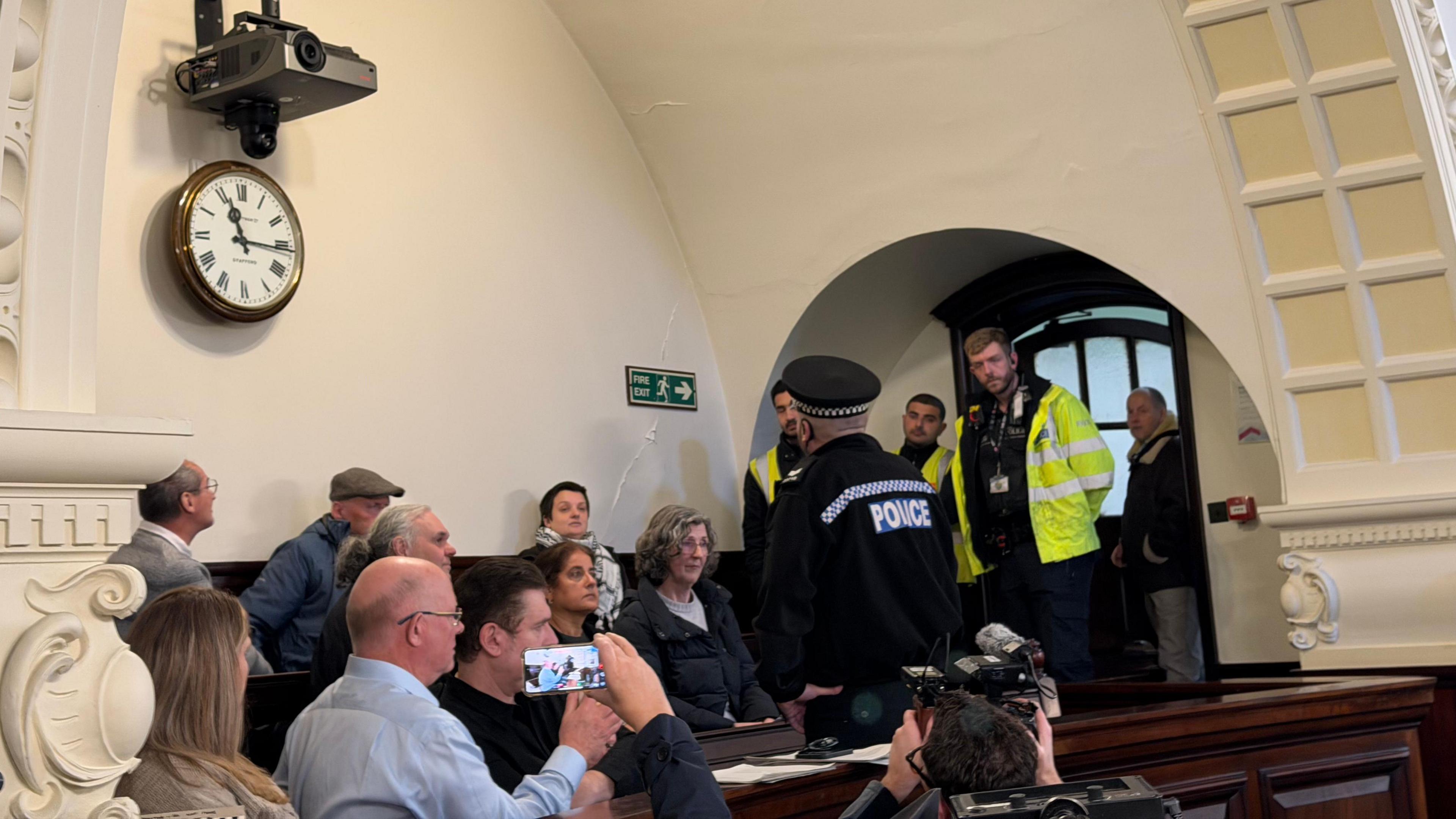 Protesters interrupt Staffordshire County Council meeting - BBC News