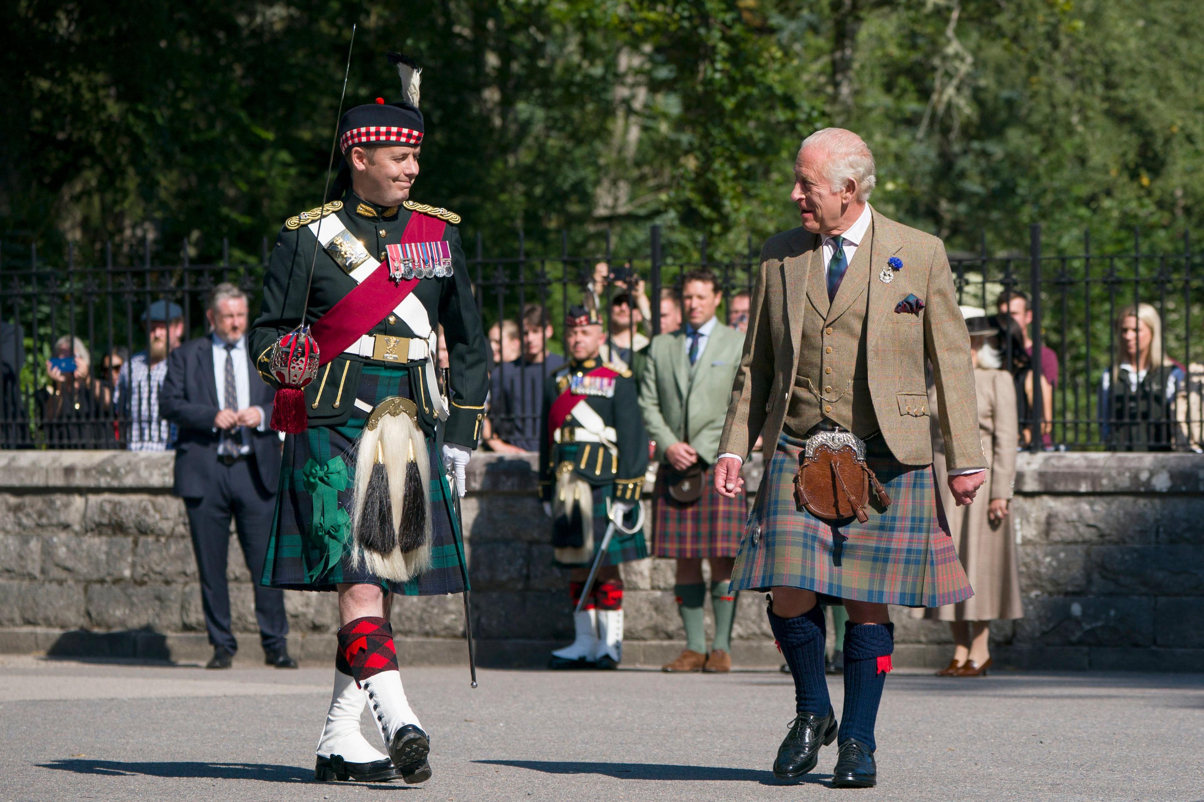 King Charles III inspects the Balaklava Company, 5th Battalion, The Royal Regiment of Scotland, at the gates of Balmoral, as he takes up summer residence at the castle. Picture date: Monday August 18, 2025. PA Photo. Photo credit should read: Jane Barlow/PA Wire
