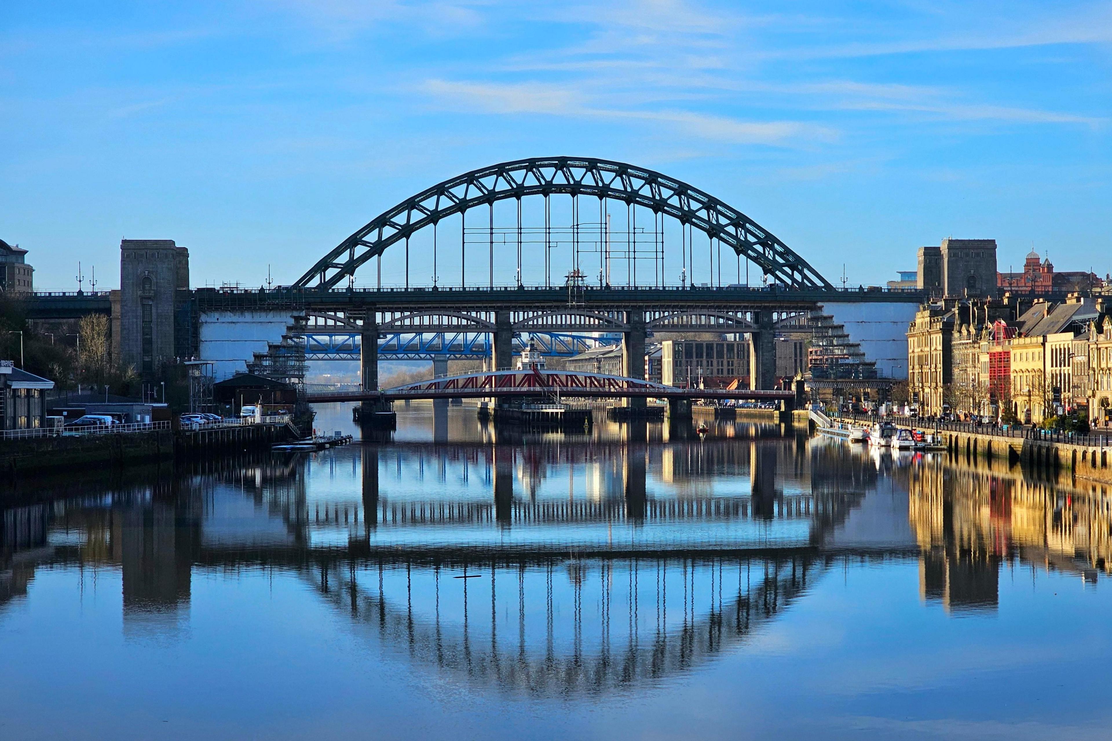 Four of the bridges across the Tyne create a reflection in the water below.