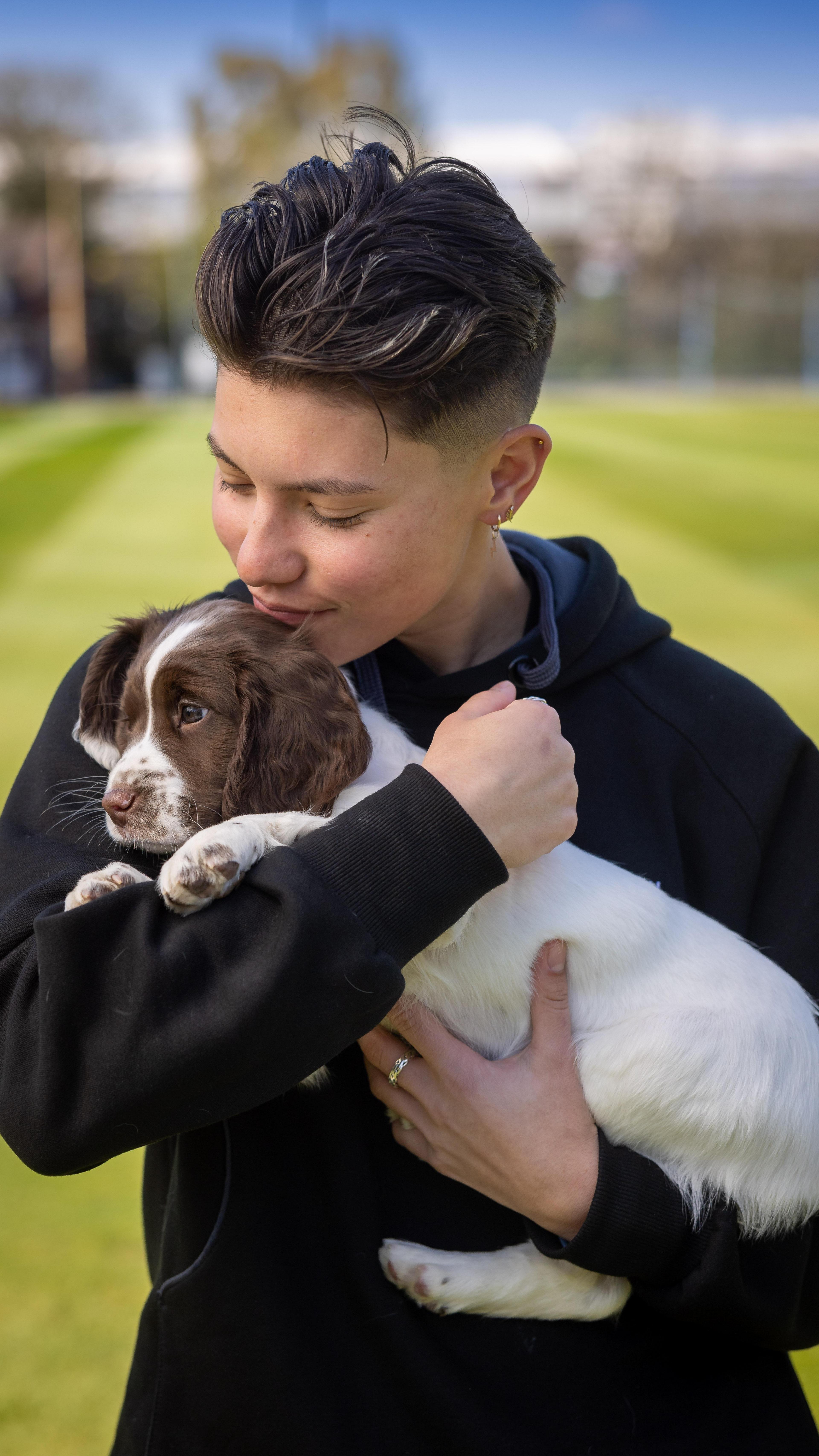 Issy Wong with puppy Issy