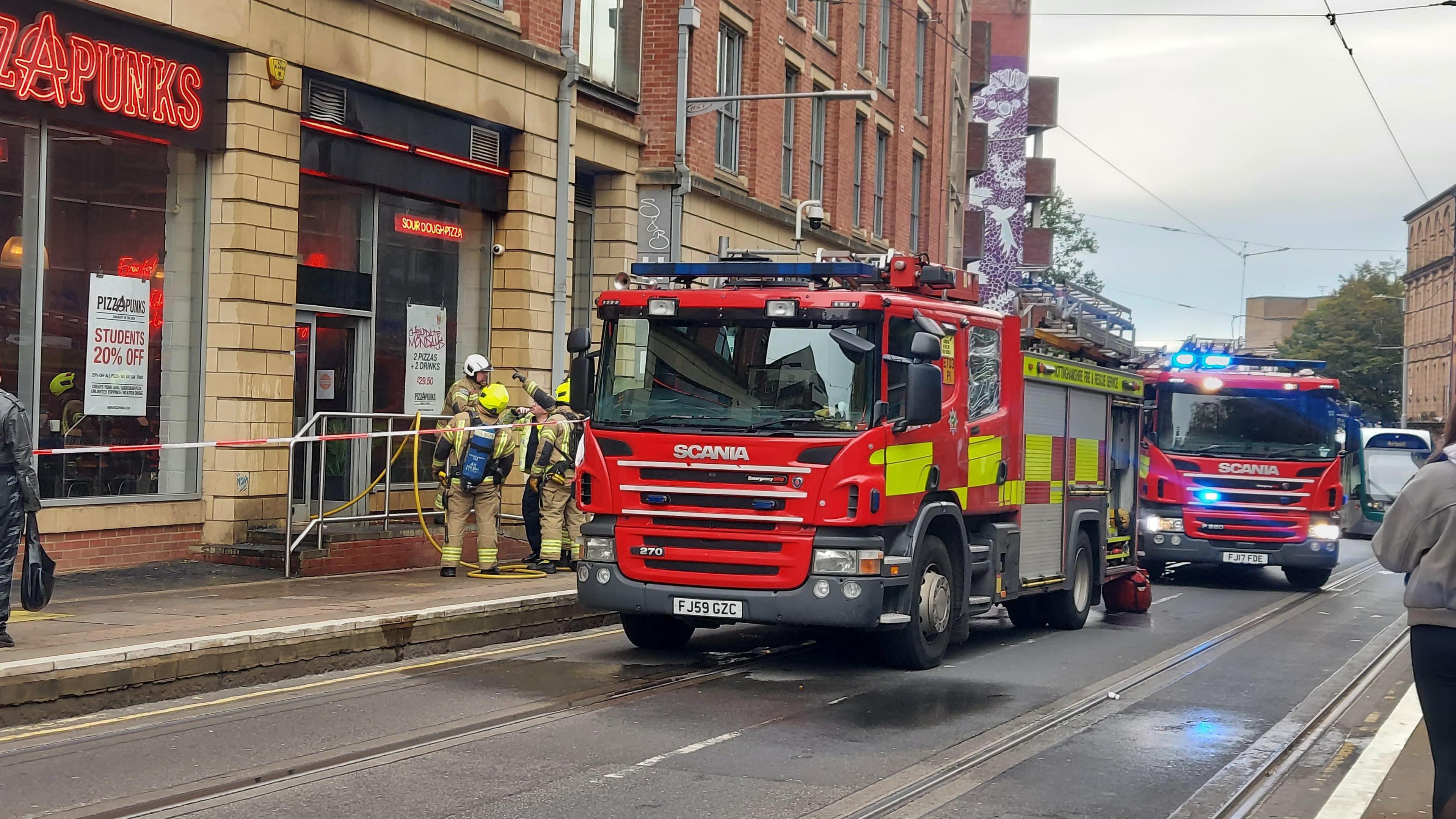 Fire engines outside the scene of a fire in the centre of Nottingham