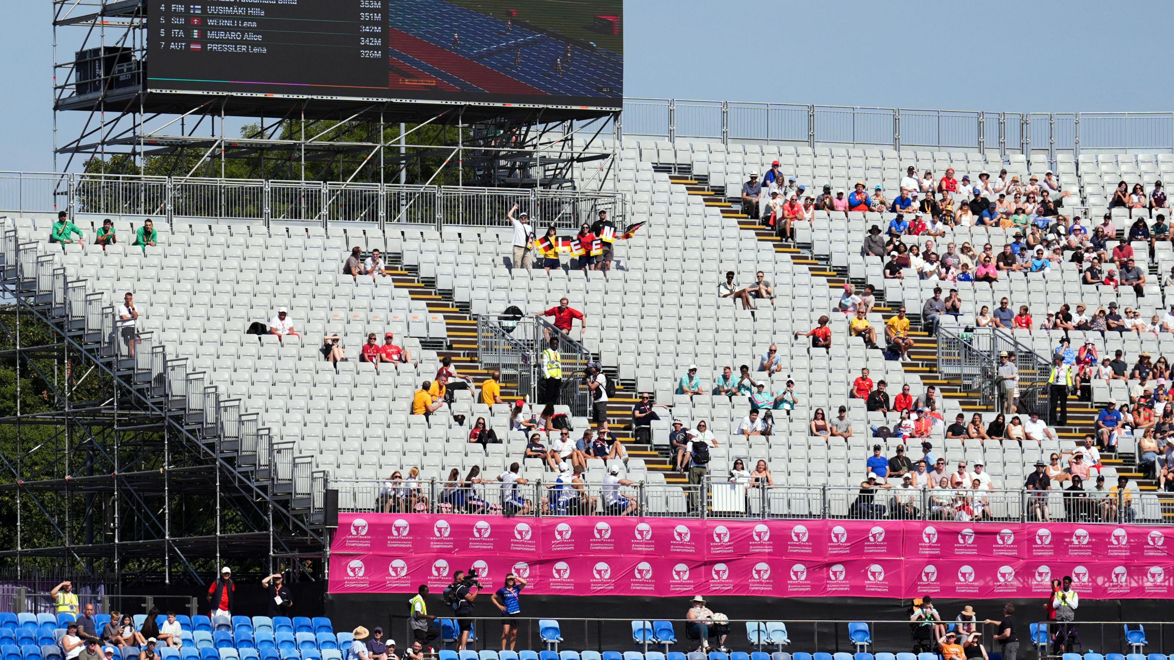 Rows of empty seats in the athletics stadium
