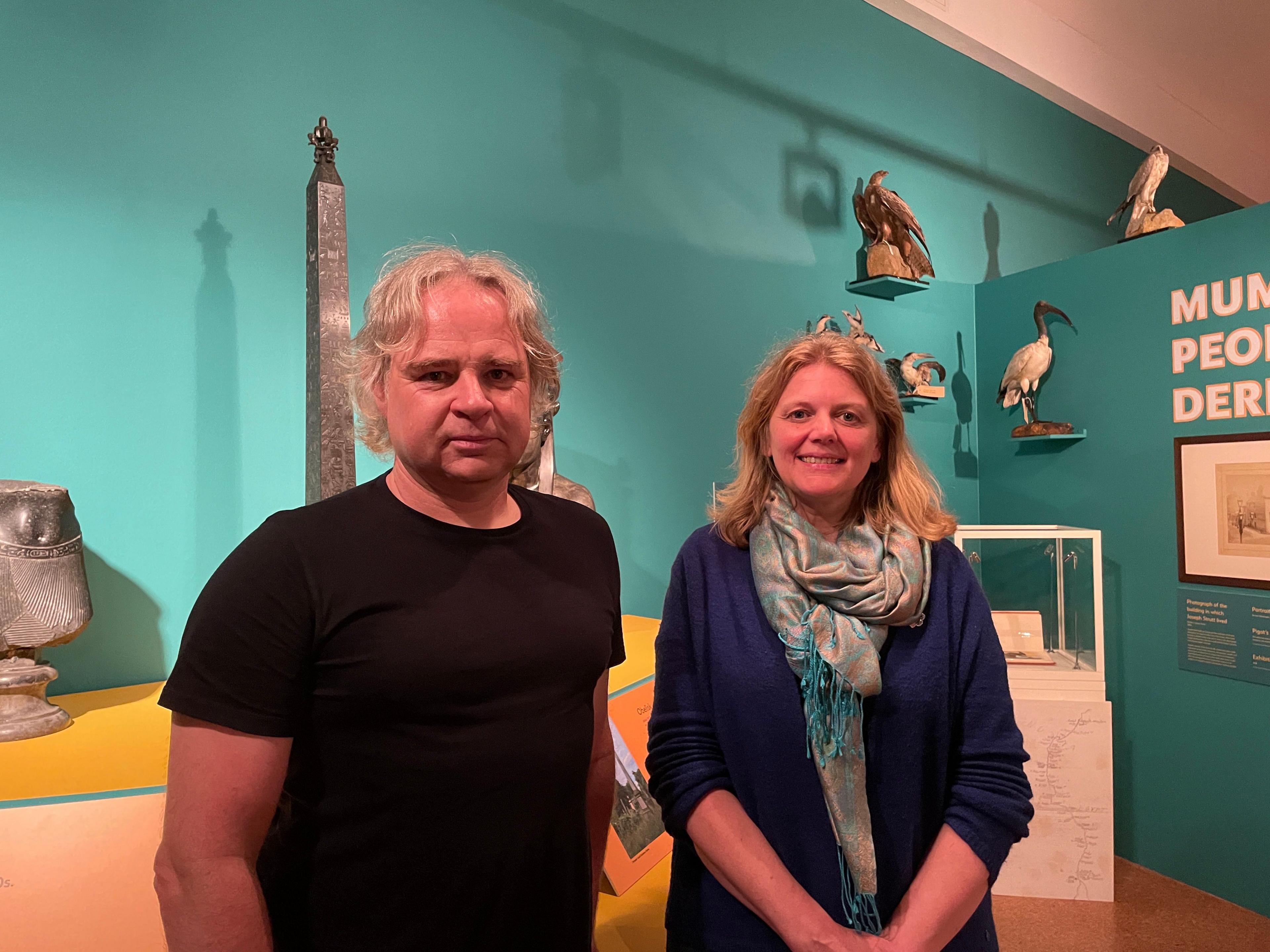 Man and woman standing in Egyptian exhibition inside Derby Museum