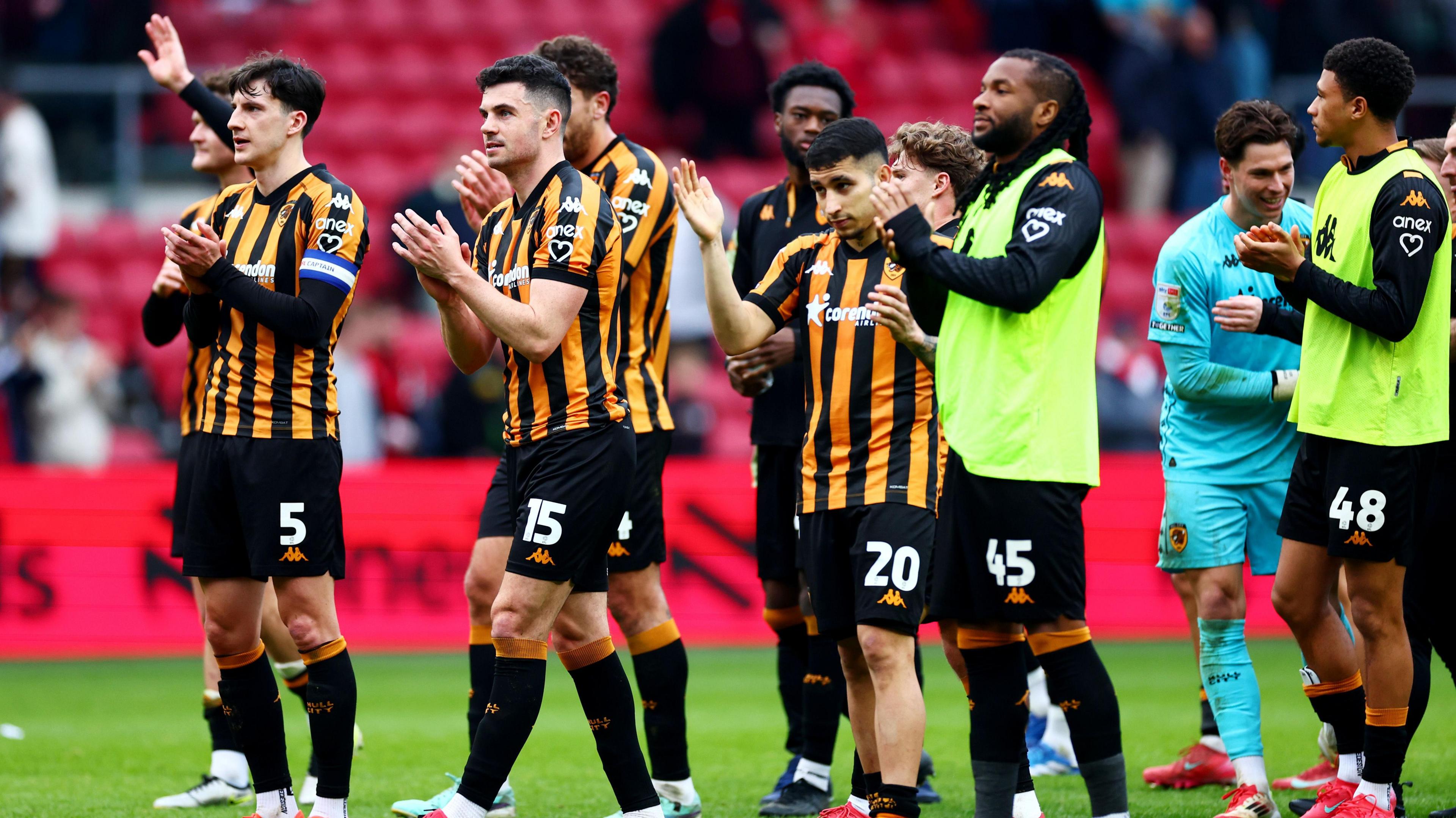 Hull City players applaud the travelling fans after the 1-1 draw at Bristol City