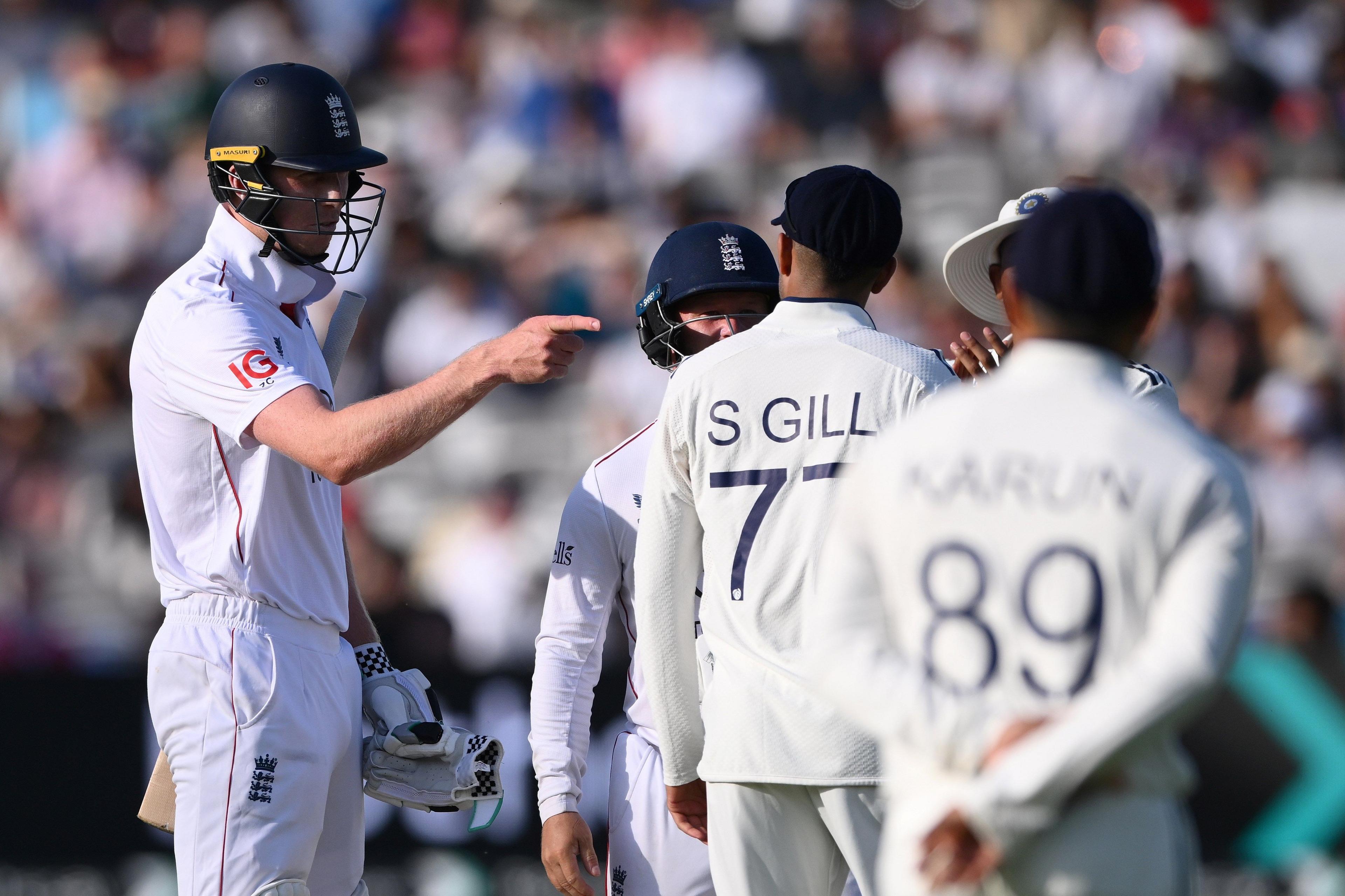 Zak Crawley responds to Gill by pointing his finger