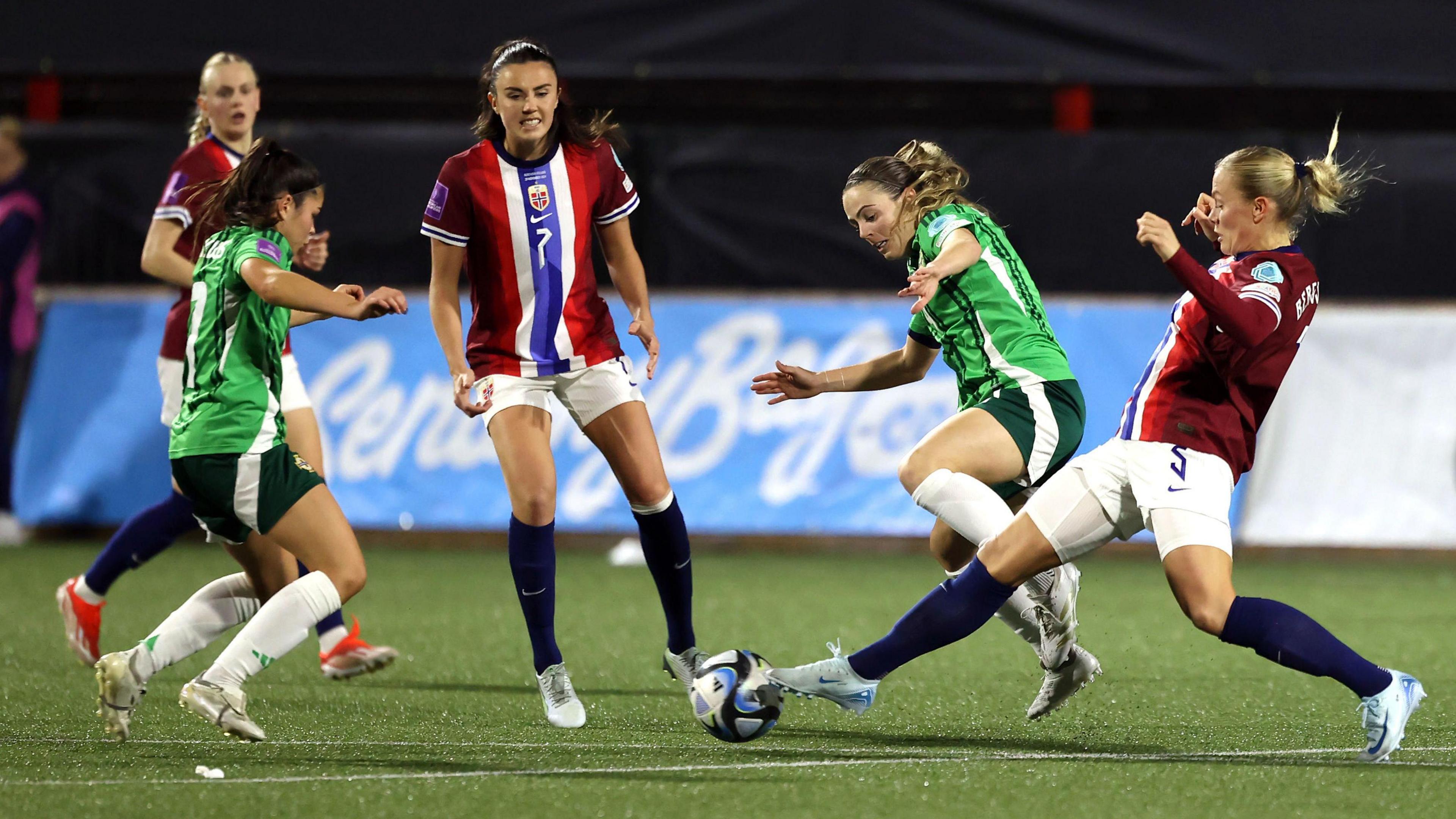 Norway's Guro Bergsvand (right) and Northern Ireland's Simone Magill battle for the ball during the first leg of the UEFA Women's Euro 2025 Qualifying playoff