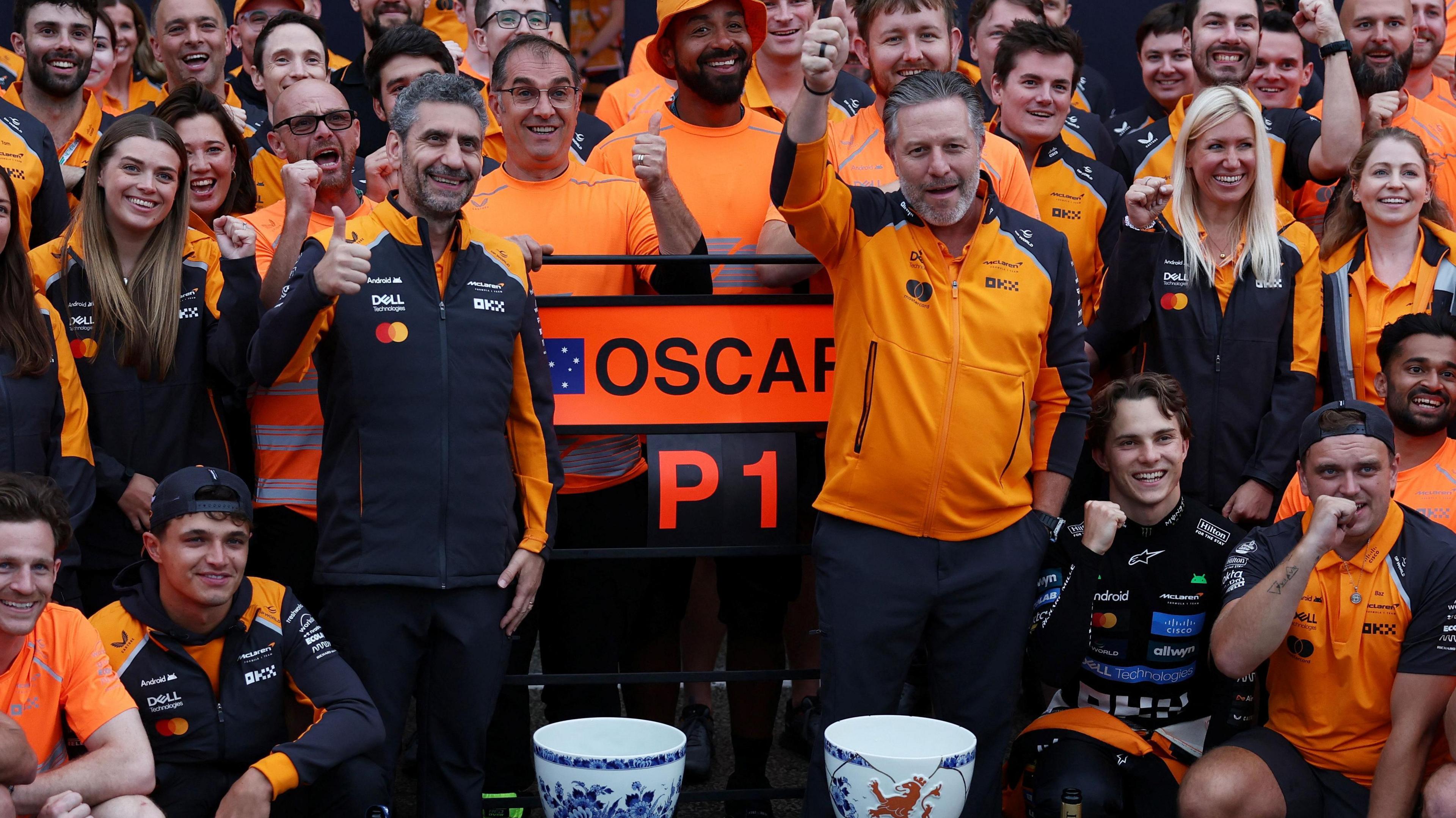 McLaren drivers and team members celebrating their performance at the Dutch Grand Prix