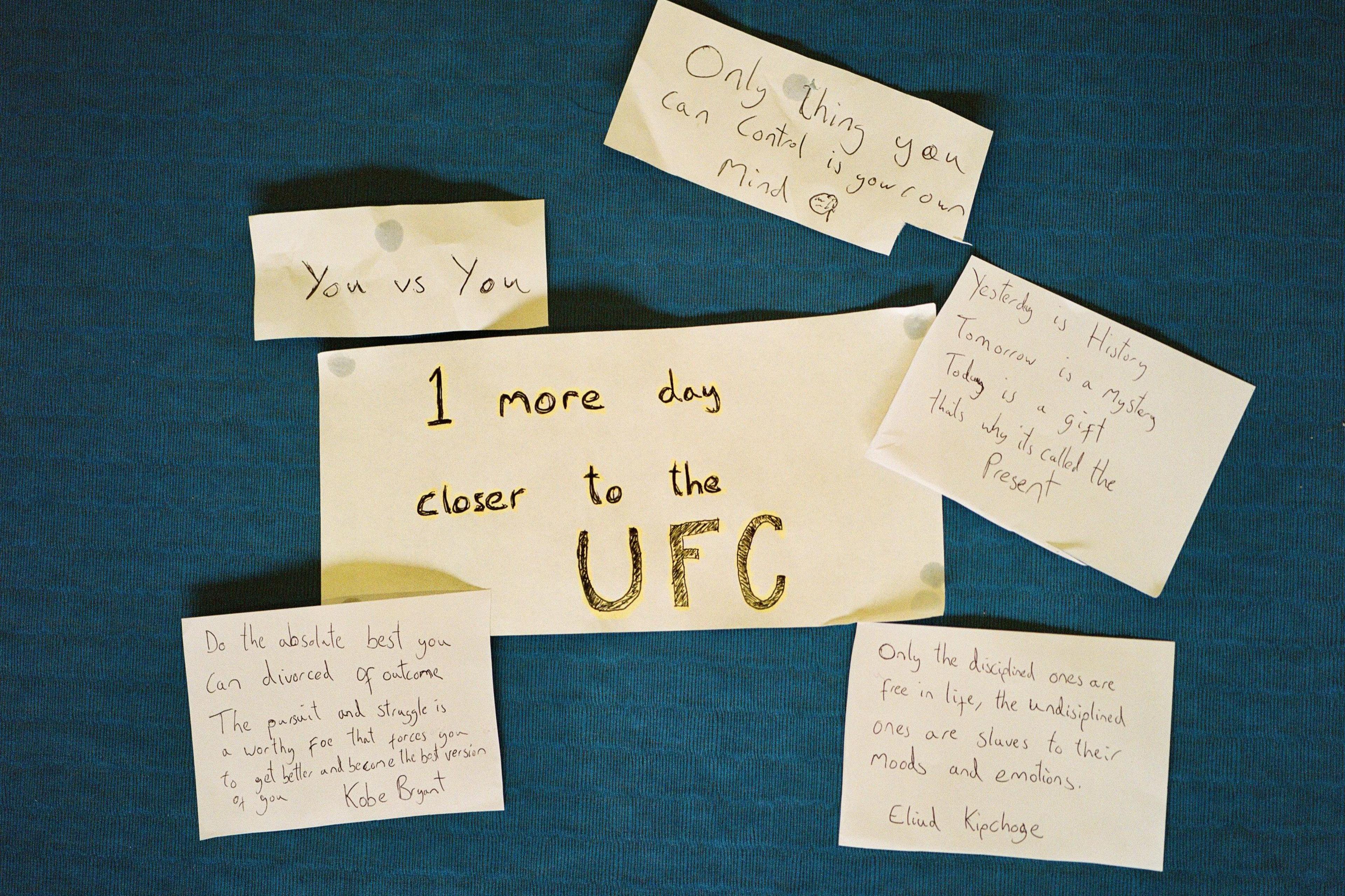 Post-it notes with motivational quotes on the wall of the Next Generation Gym in Liverpool