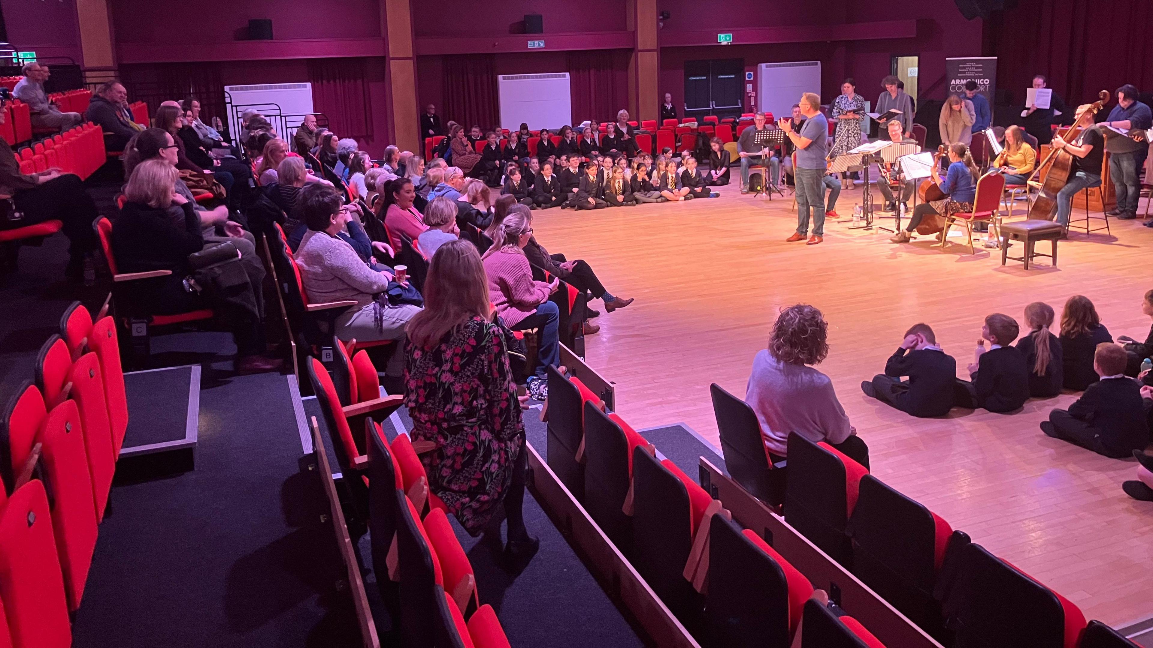 Parents watching the children perform