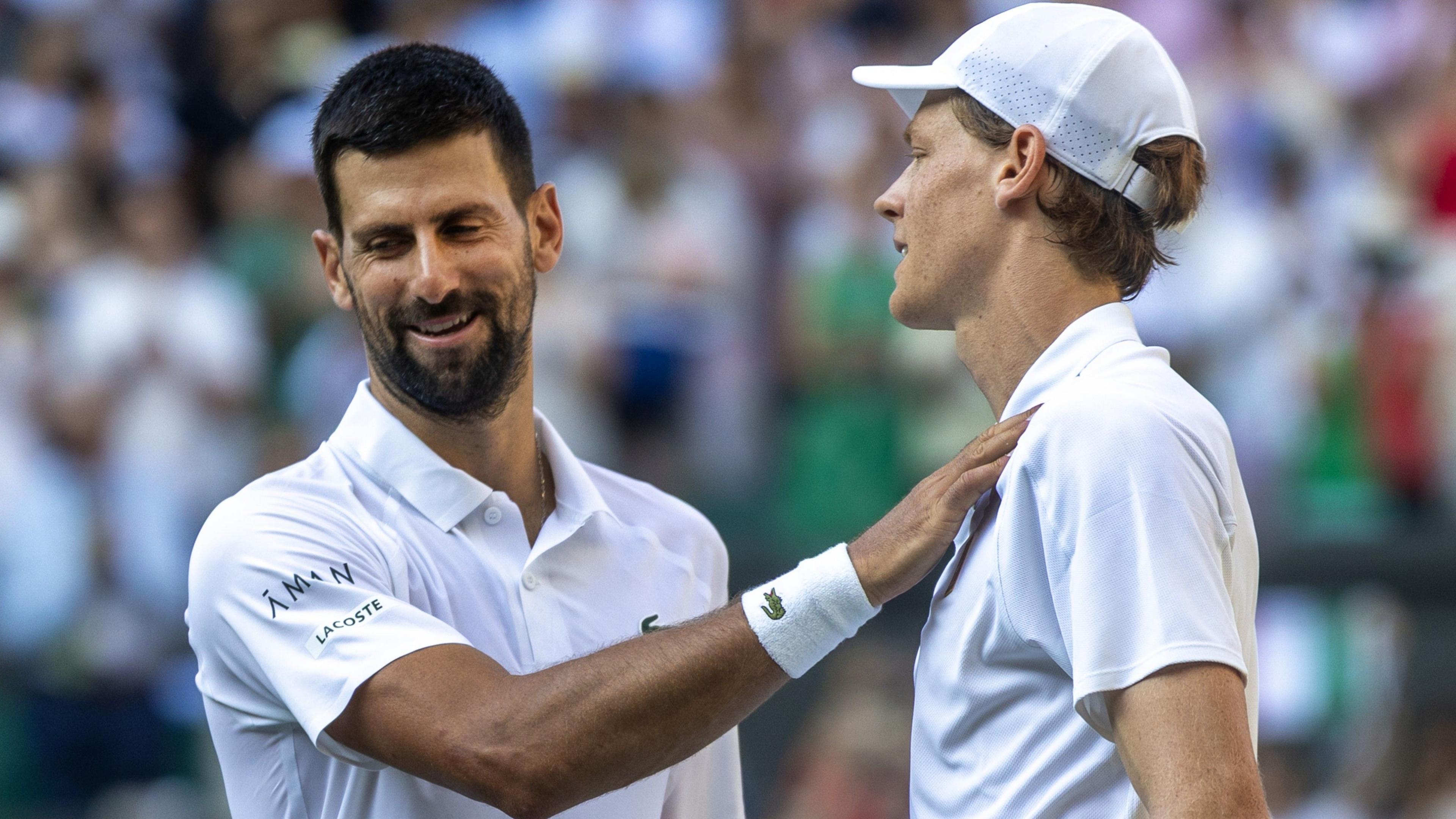 Novak Djokovic congratulates Jannik Sinner at Wimbledon in 2025