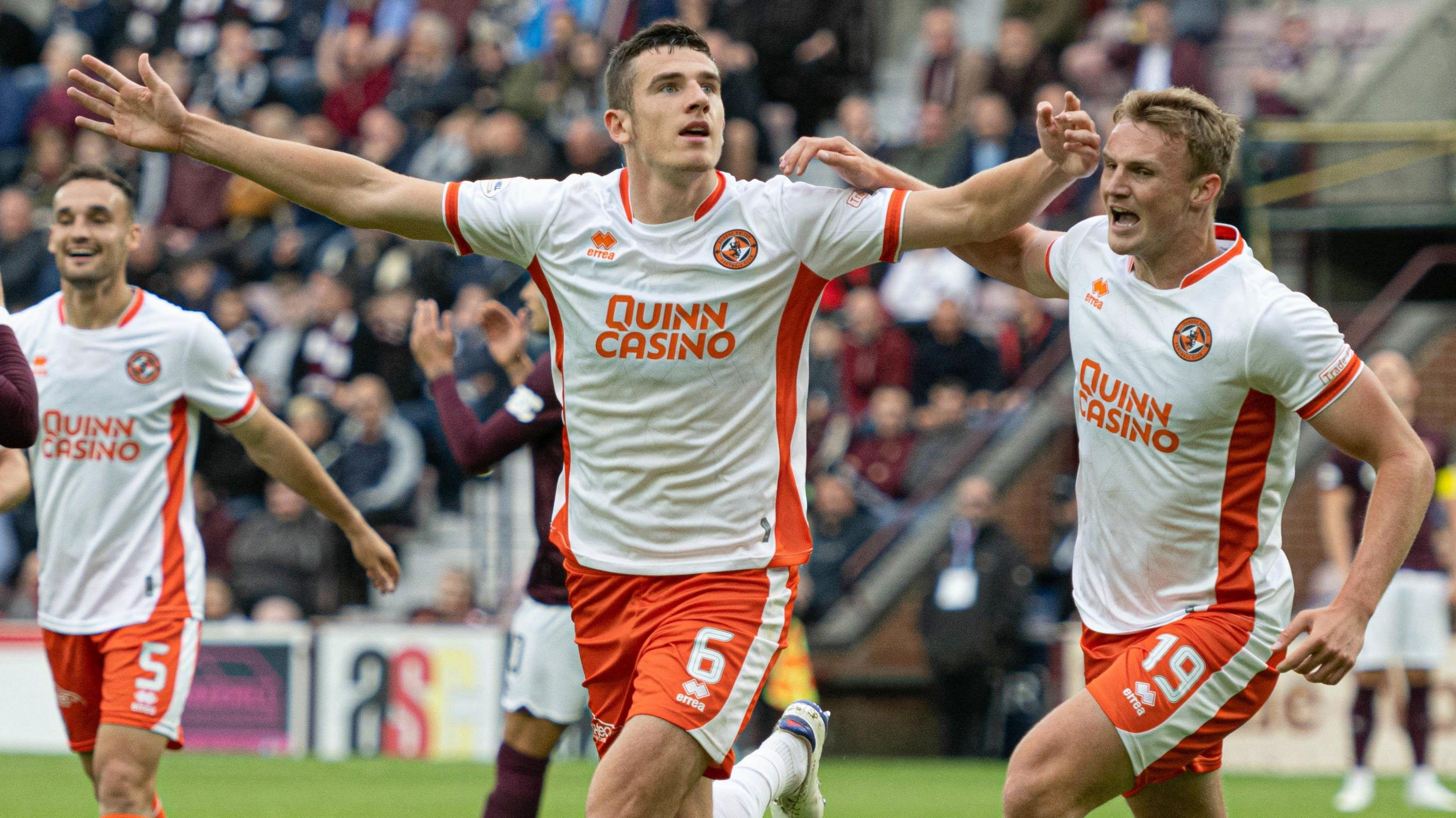 Ross Graham celebrates scoring for Dundee United at Hearts