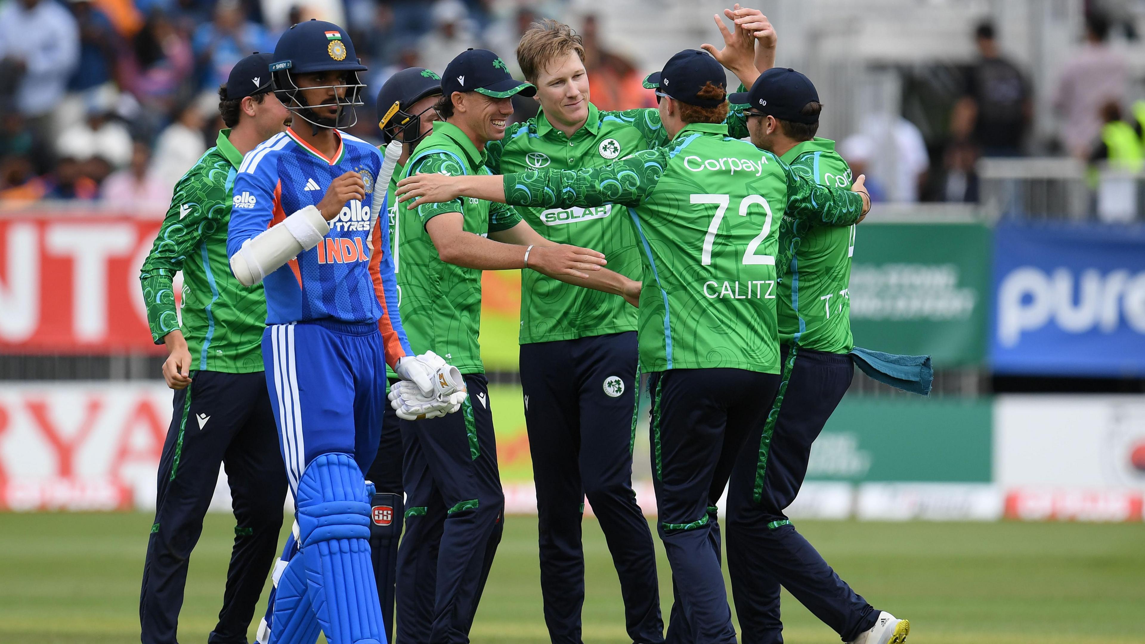 Harry Tector and his Ireland team-mates celebrate