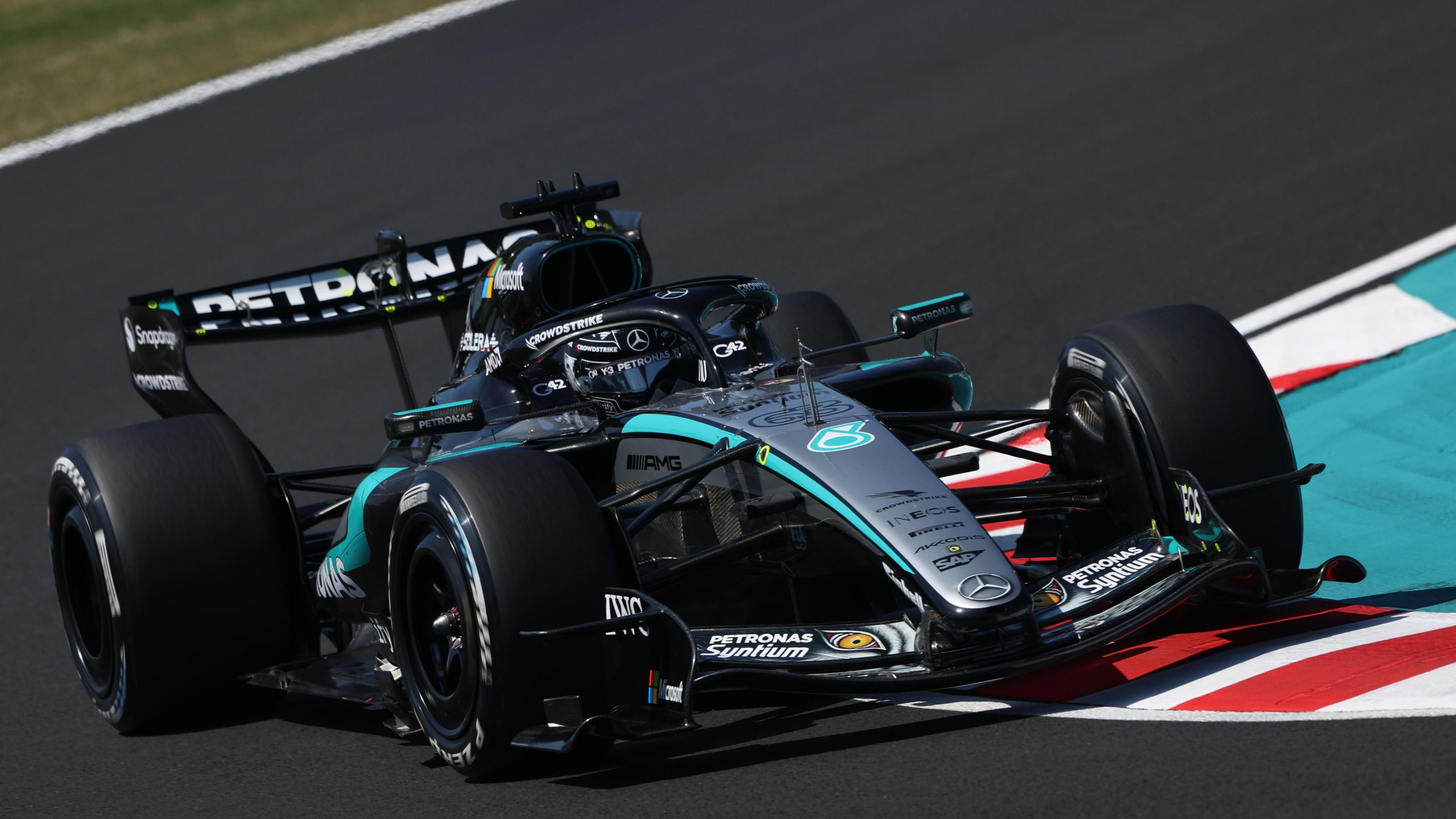 Mercedes' George Russell takes a corner during first practice for the Japanese Grand Prix