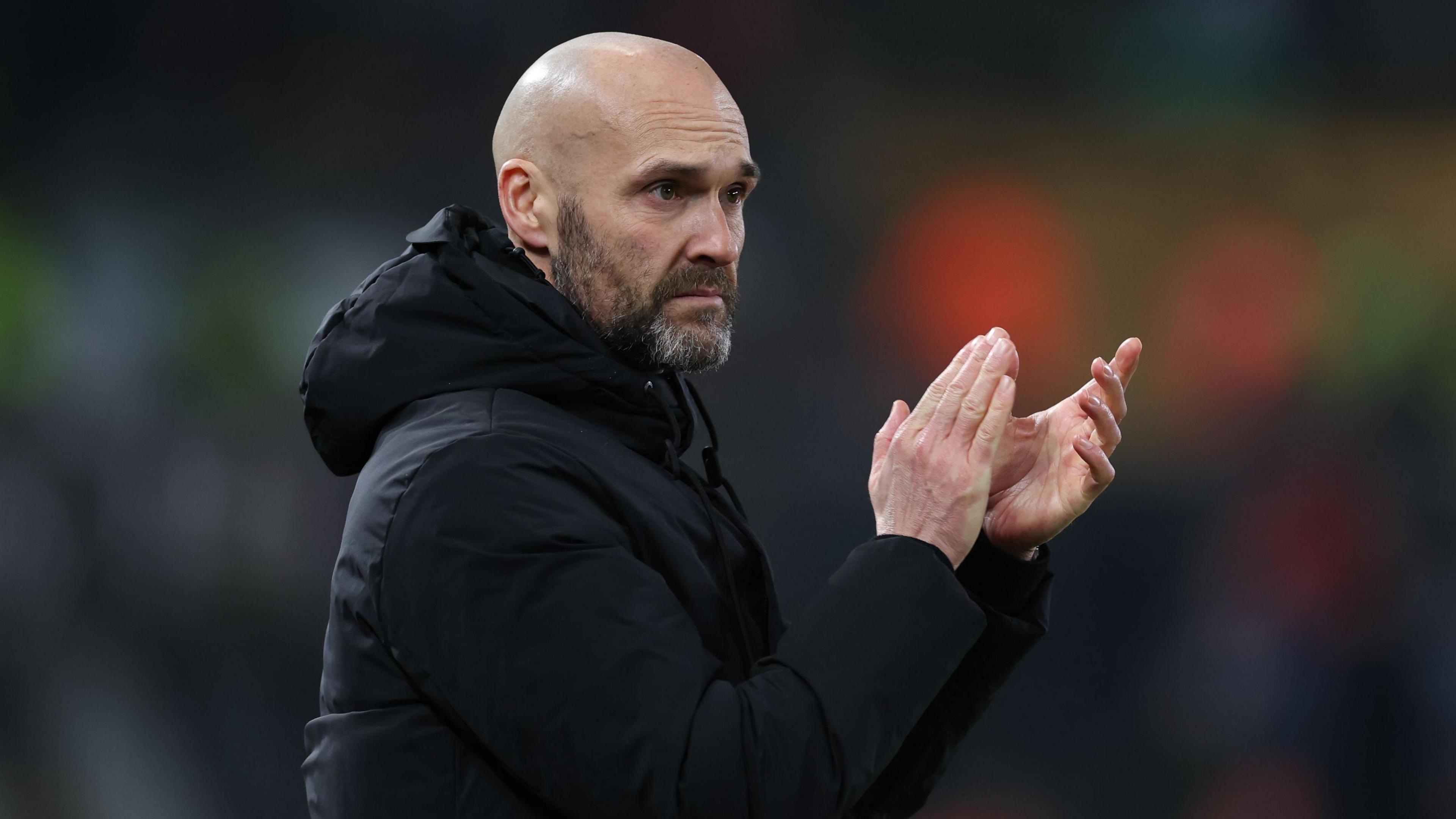 Swansea head coach Luke Williams applauds his team 