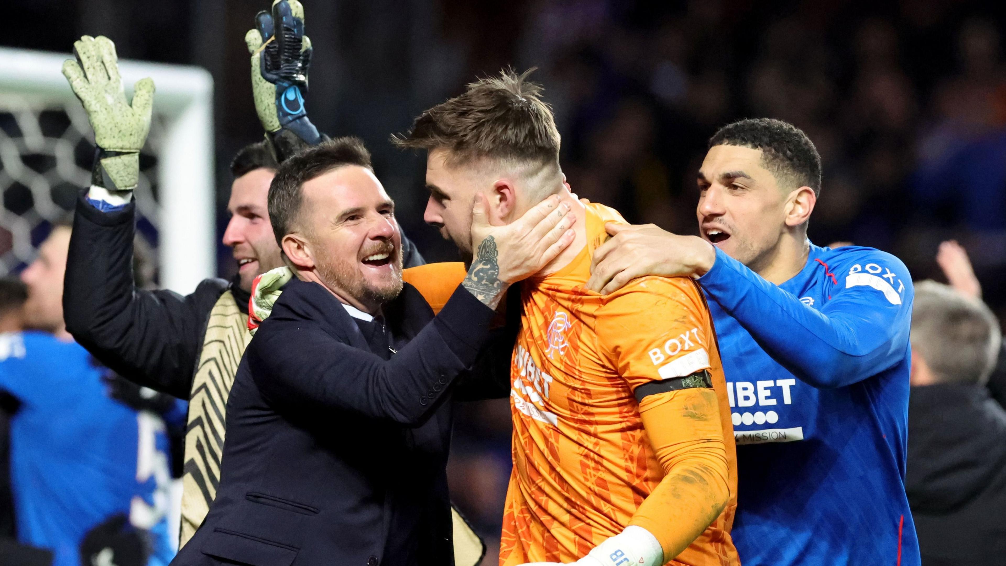 Barry Ferguson celebrates with goalkeeper Jack Butland 