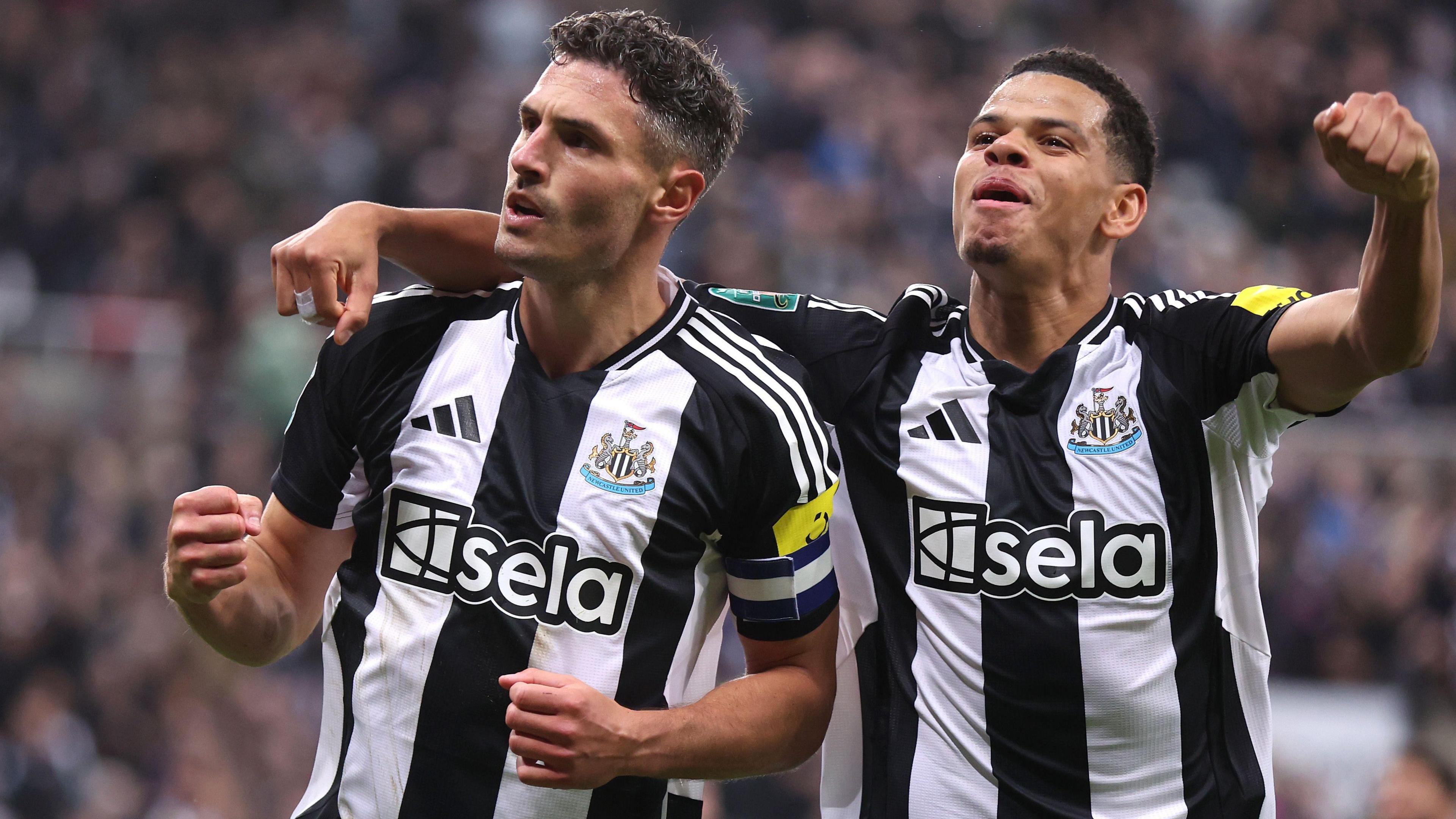 Fabian Schar celebrates scoring with Newcastle team-mate William Osula