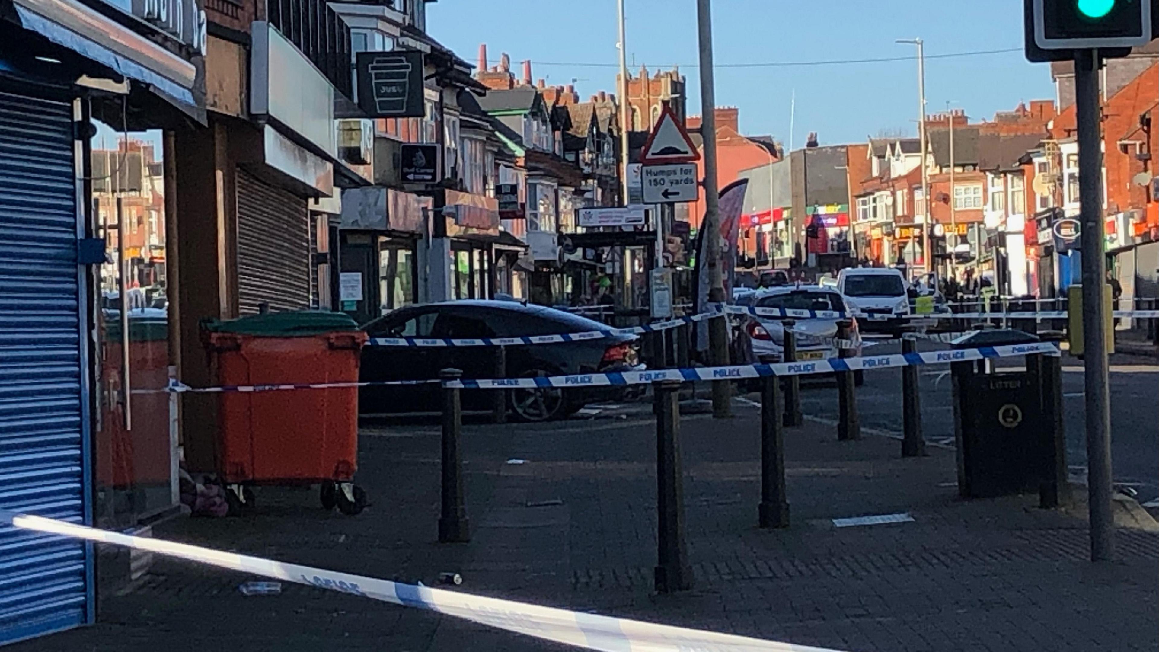 Photograph of Evington Road with police cordon in place