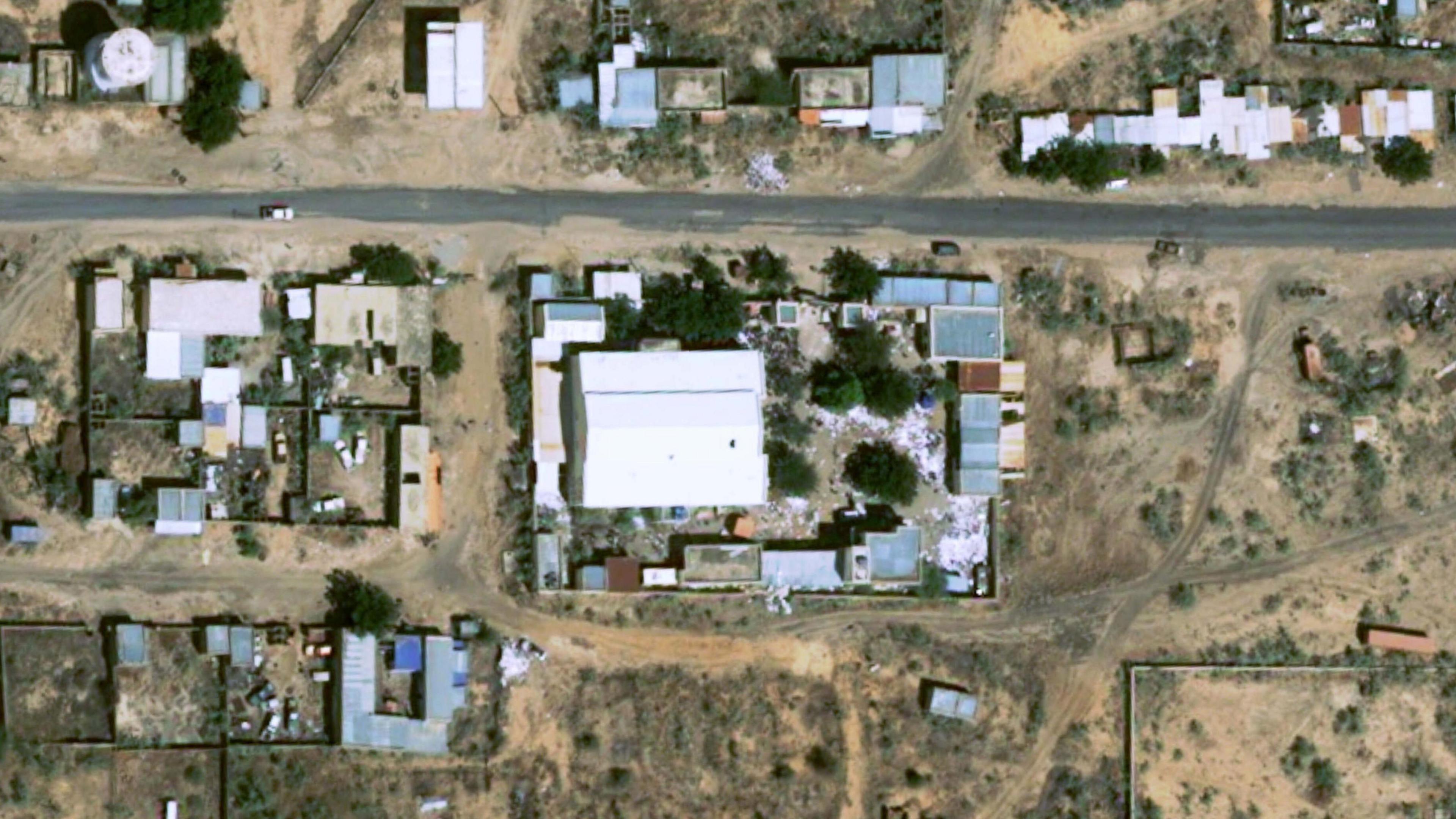 Satellite image shows objects on the ground at a former children’s hospital in El Fasher, Sudan