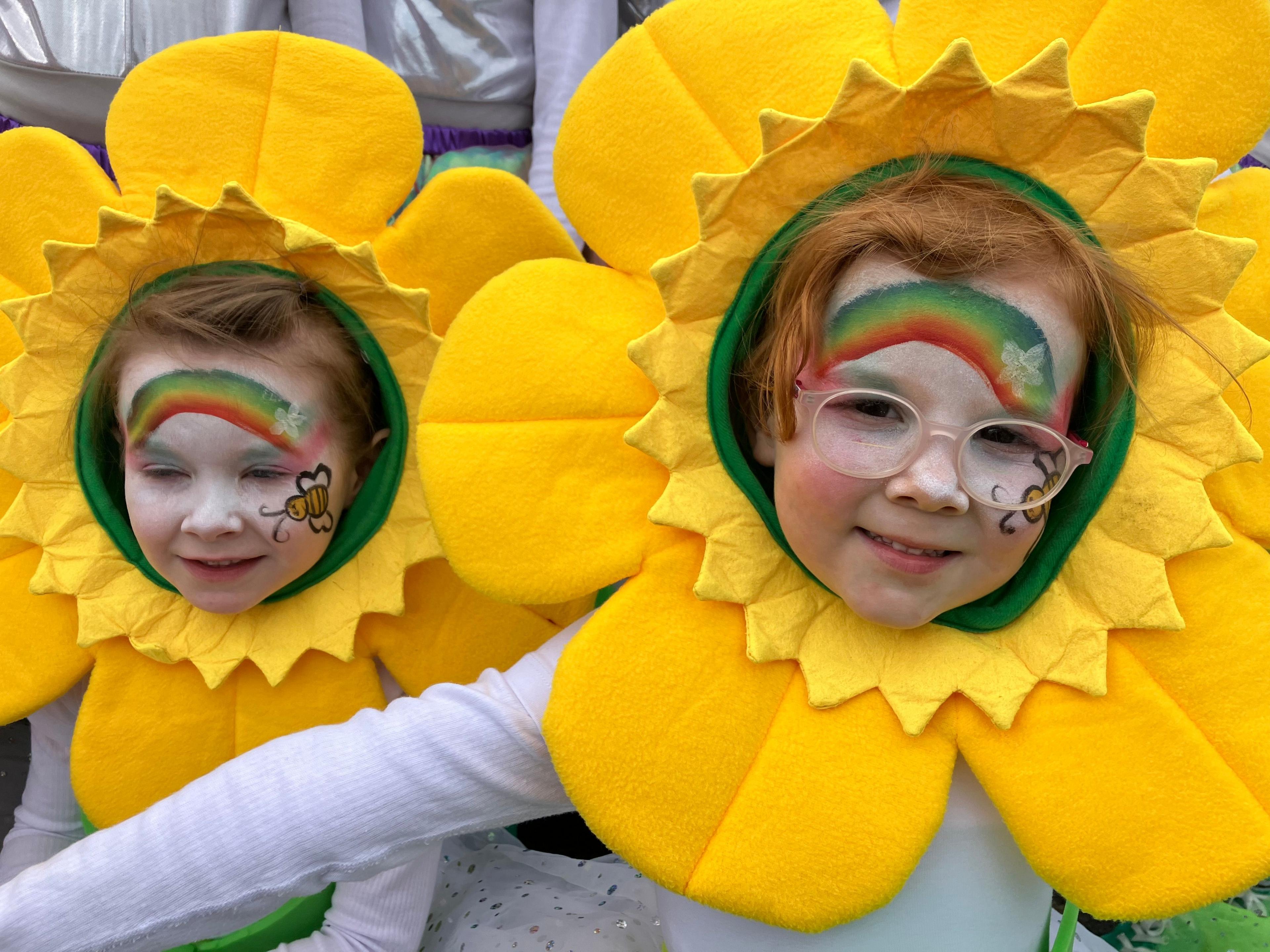 two girls in sunflower costumes