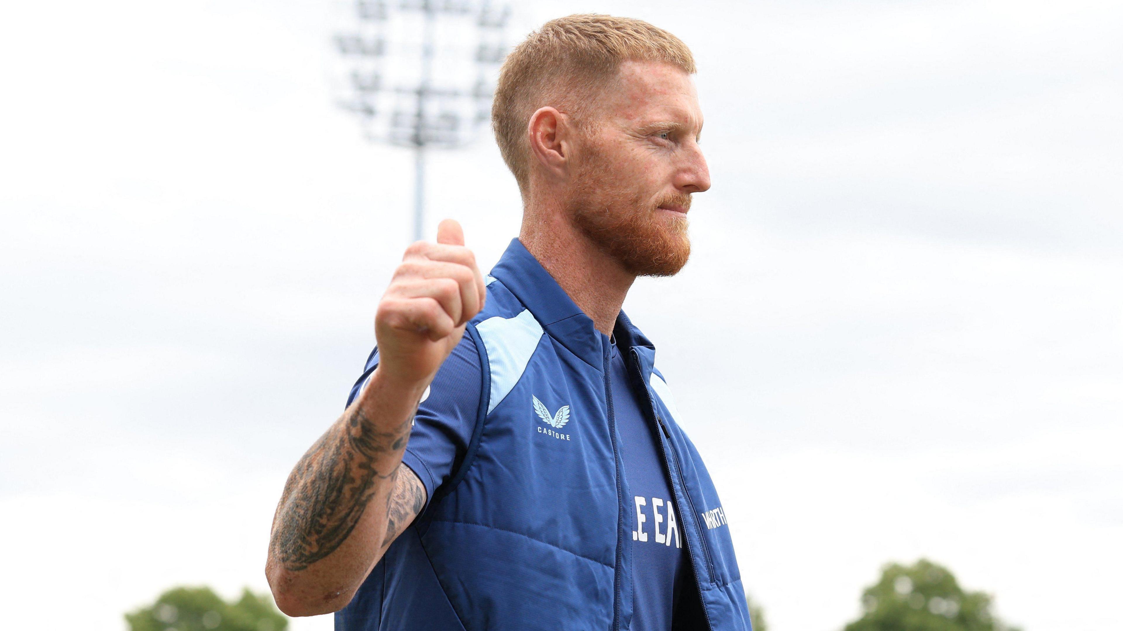 Outgoing England Test captain Ben Stokes gives a thumbs up as he walks past the camera