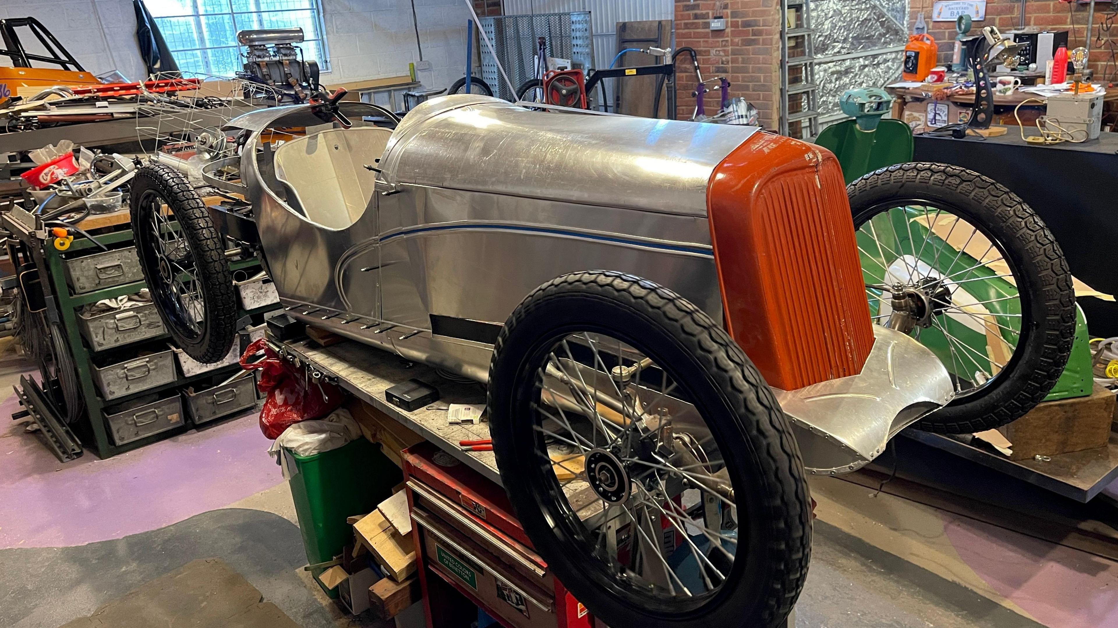 Cyclekart with metal bodywork yet to be painted but the front grille is bright orange