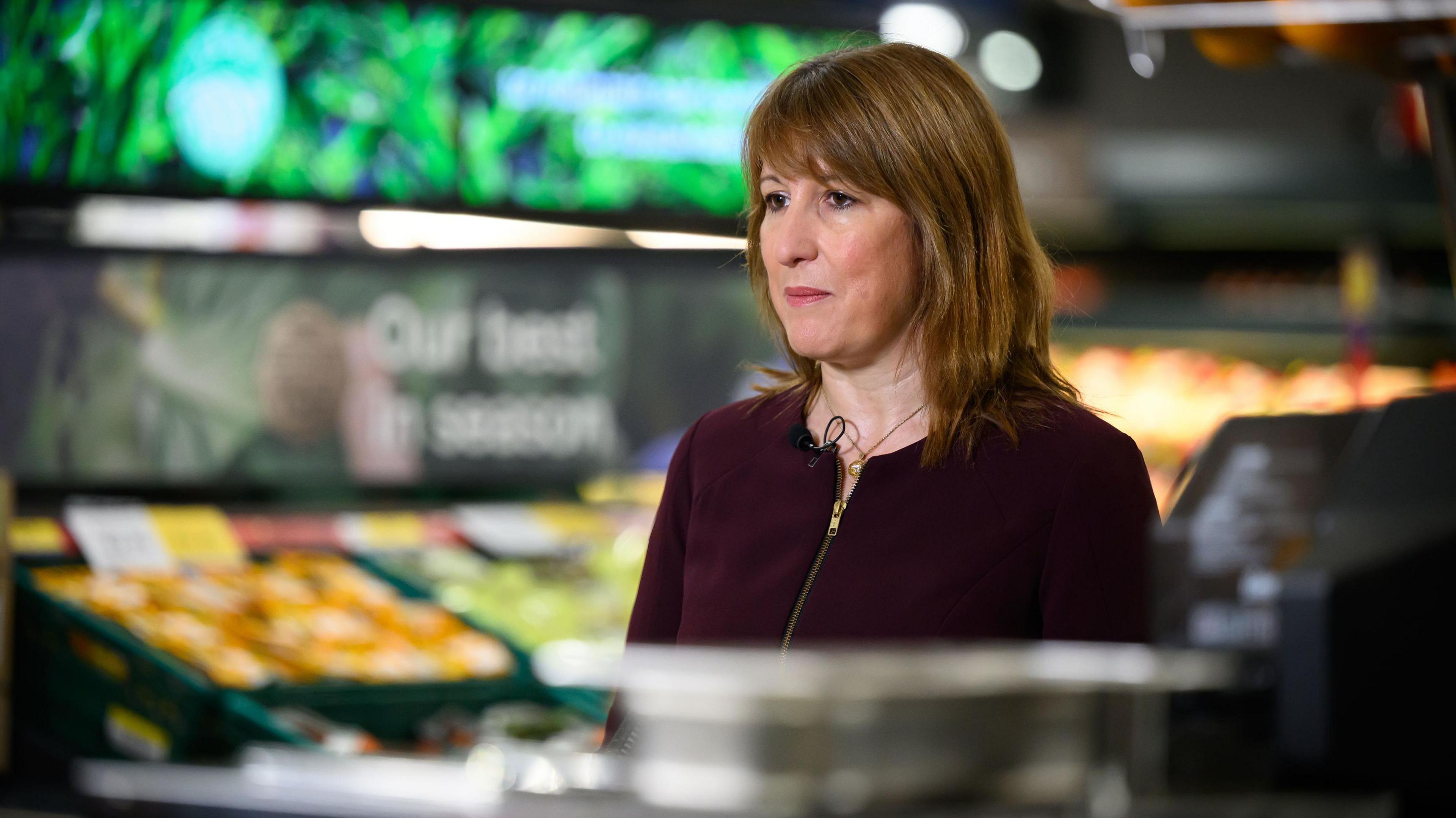 Chancellor of the Exchequer Rachel Reeves speaking to the media about the inflation - she is stood inside a supermarket ahead of the Budget.
