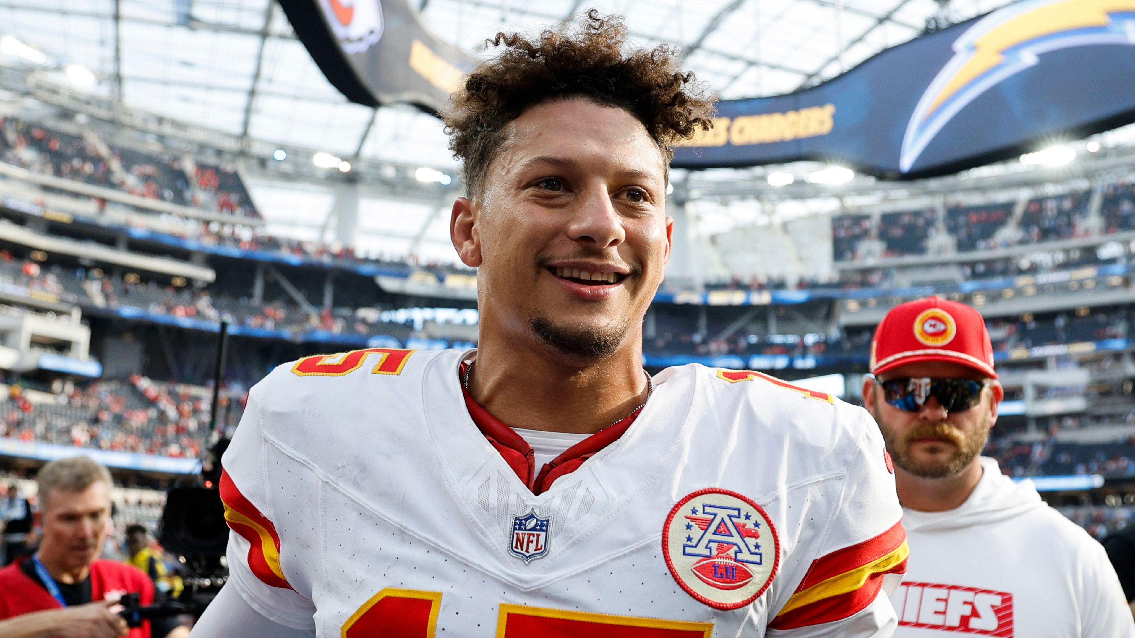 Kansas City Chiefs quarterback Patrick Mahomes speaks with fans after the game