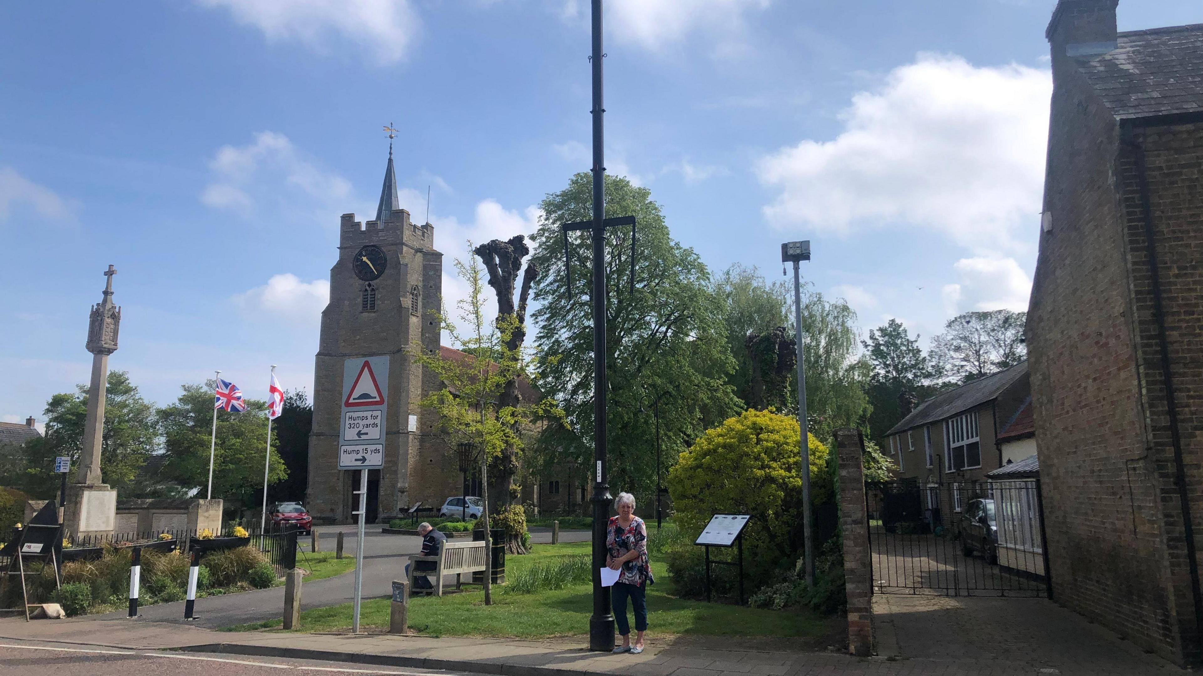 Sue Unwin stood next to a lamppost