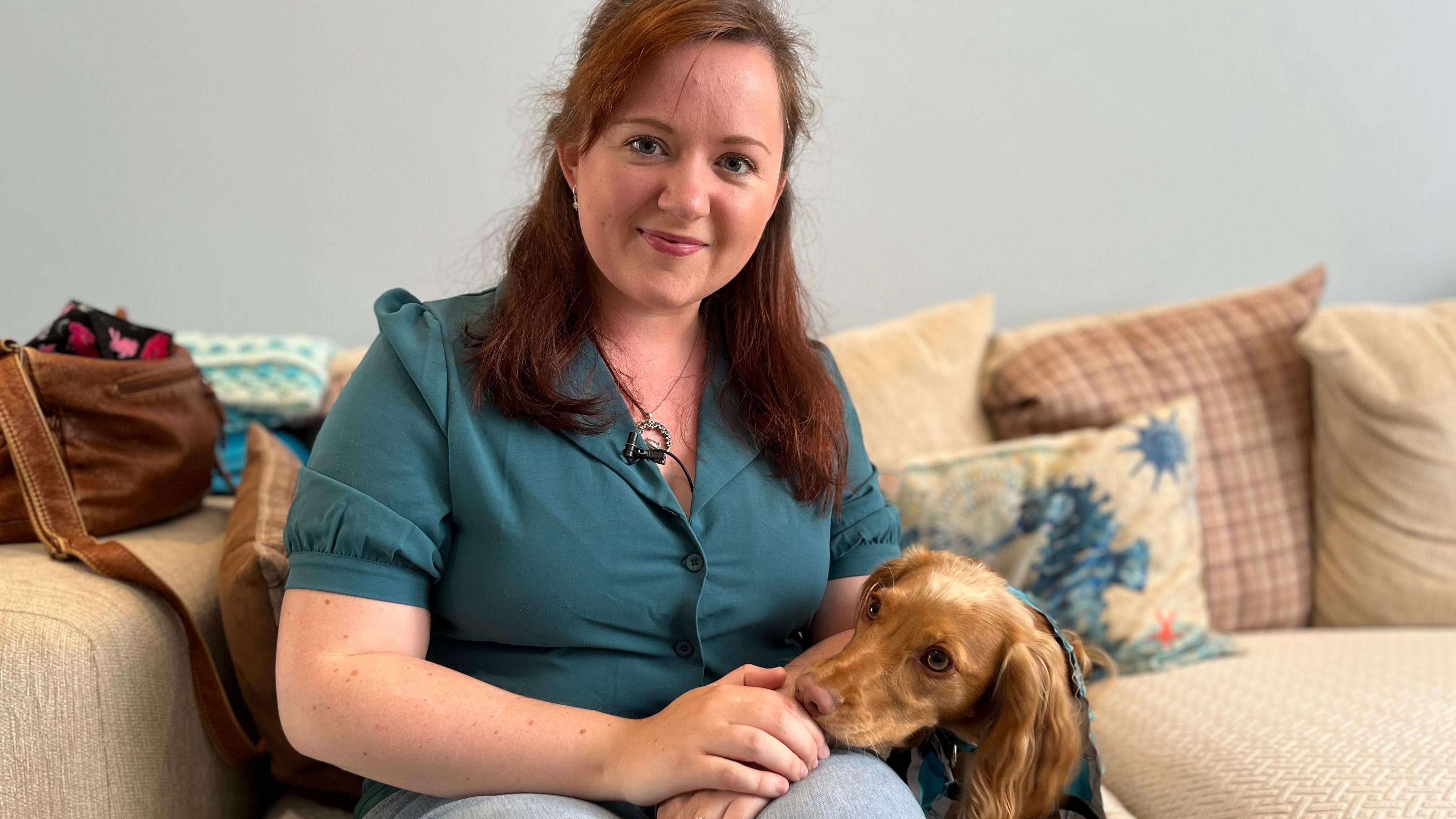 Rachel Le Messurier and her assistance dog Lily