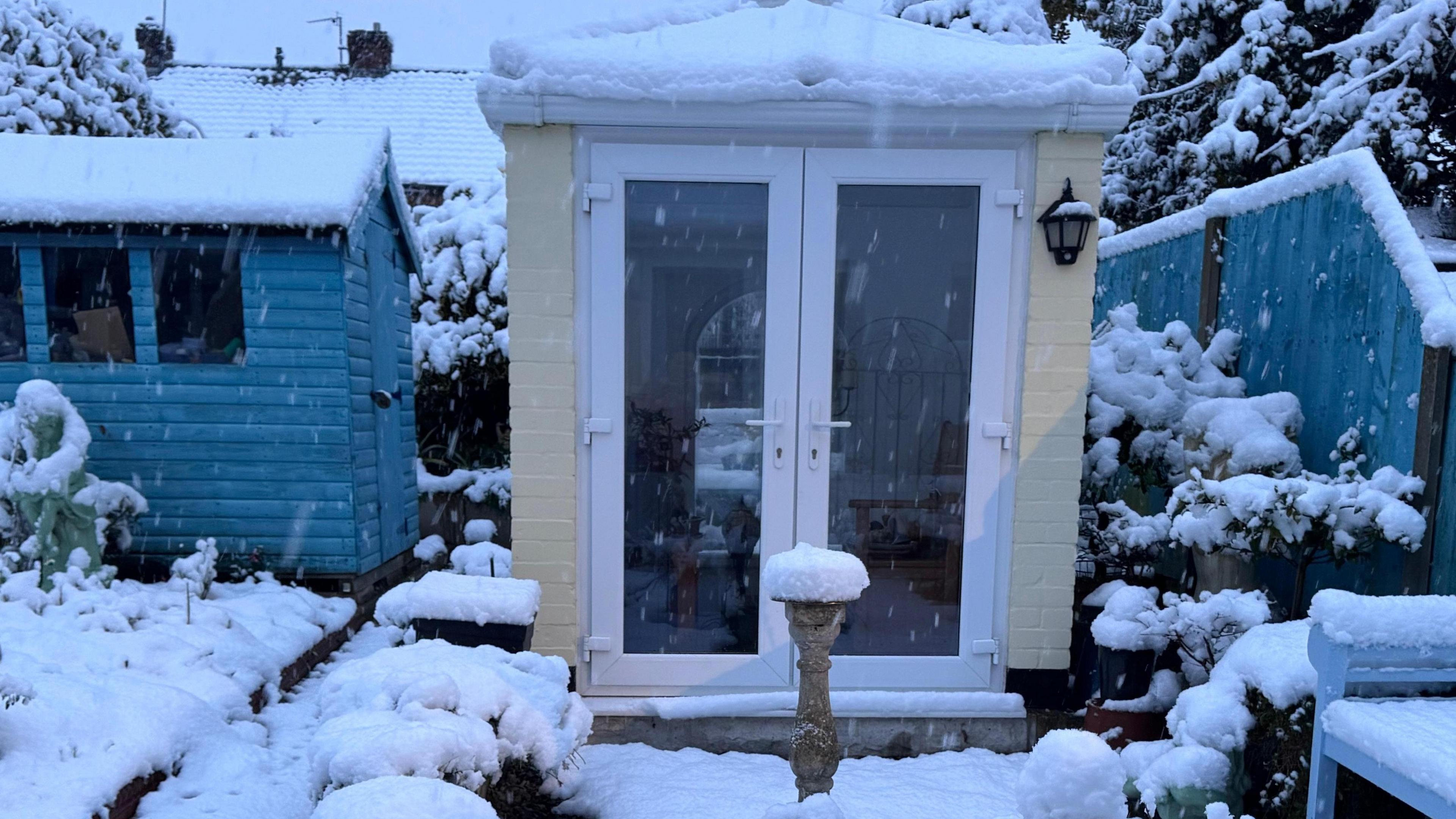 Deep snow in a back garden