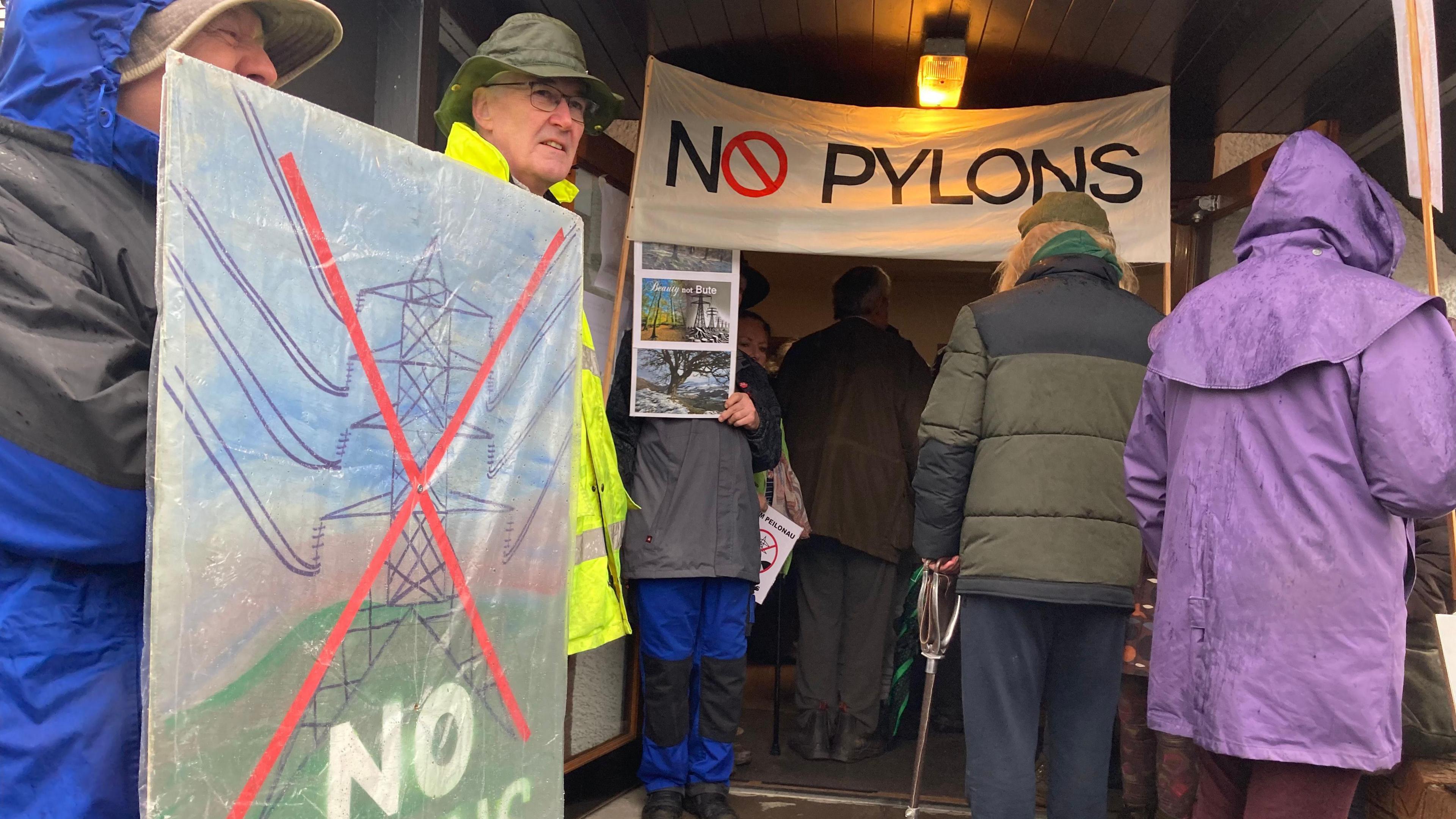 Protestors against pylons meet at a village hall in Cellan, Ceredigion.