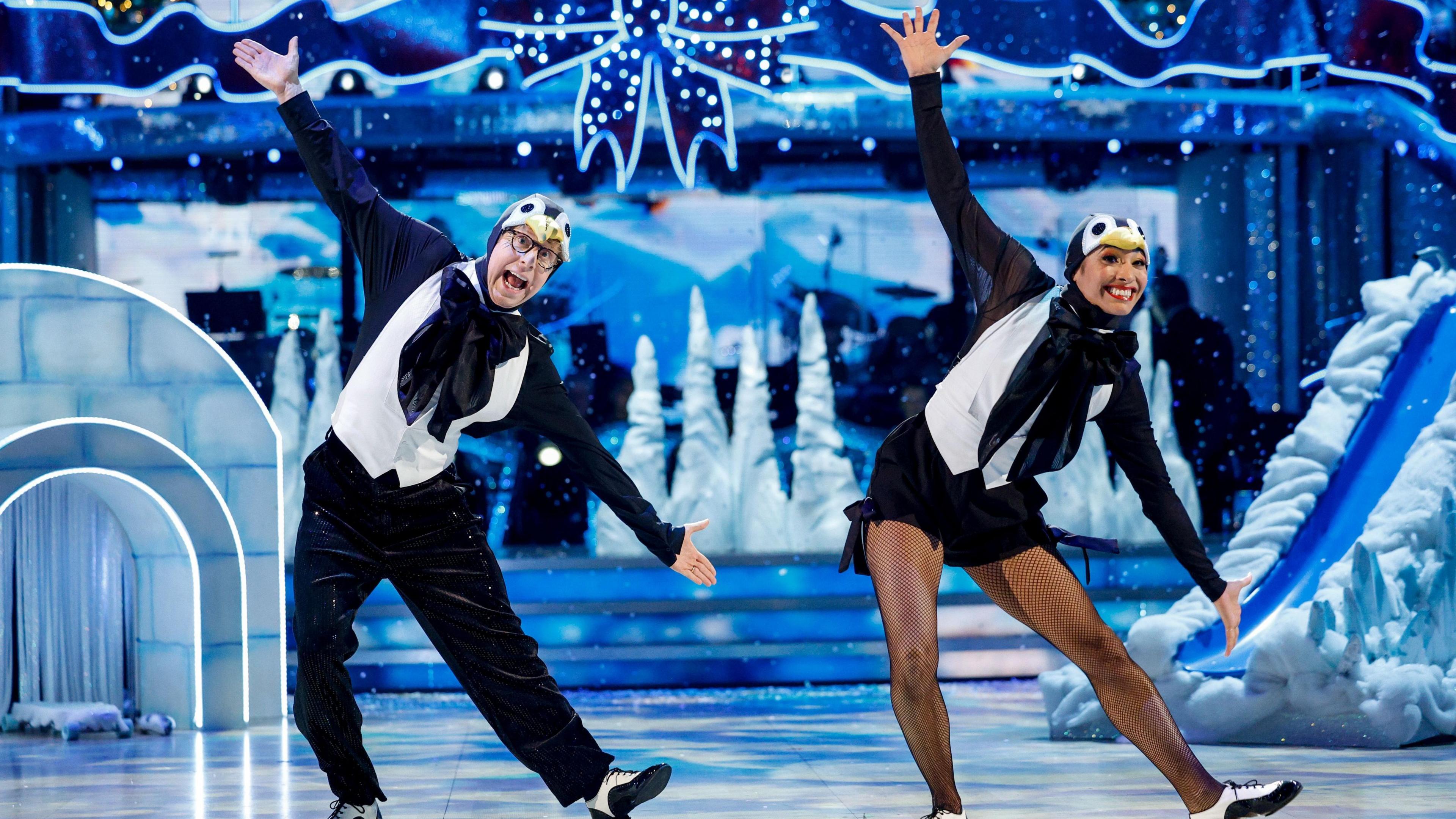 Josh Widdicombe dressed as a penguin dancing with his partner on Strictly Come Dancing 