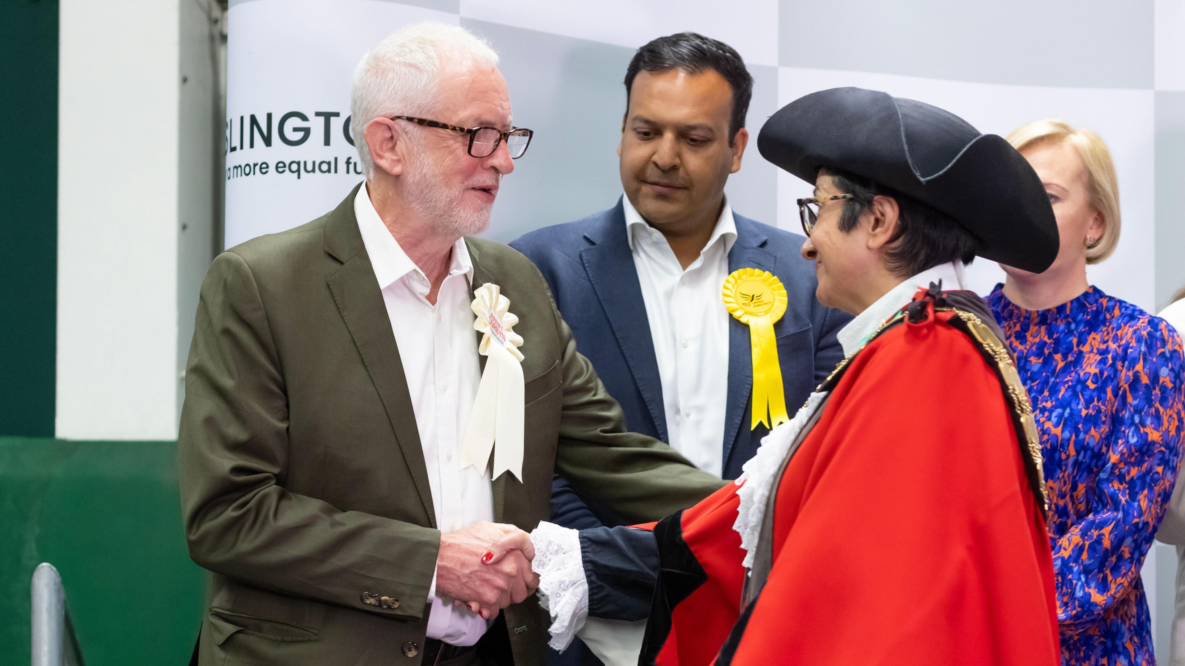 Independent MP Jeremy Corbyn shaking the hand of an official after winning his seat