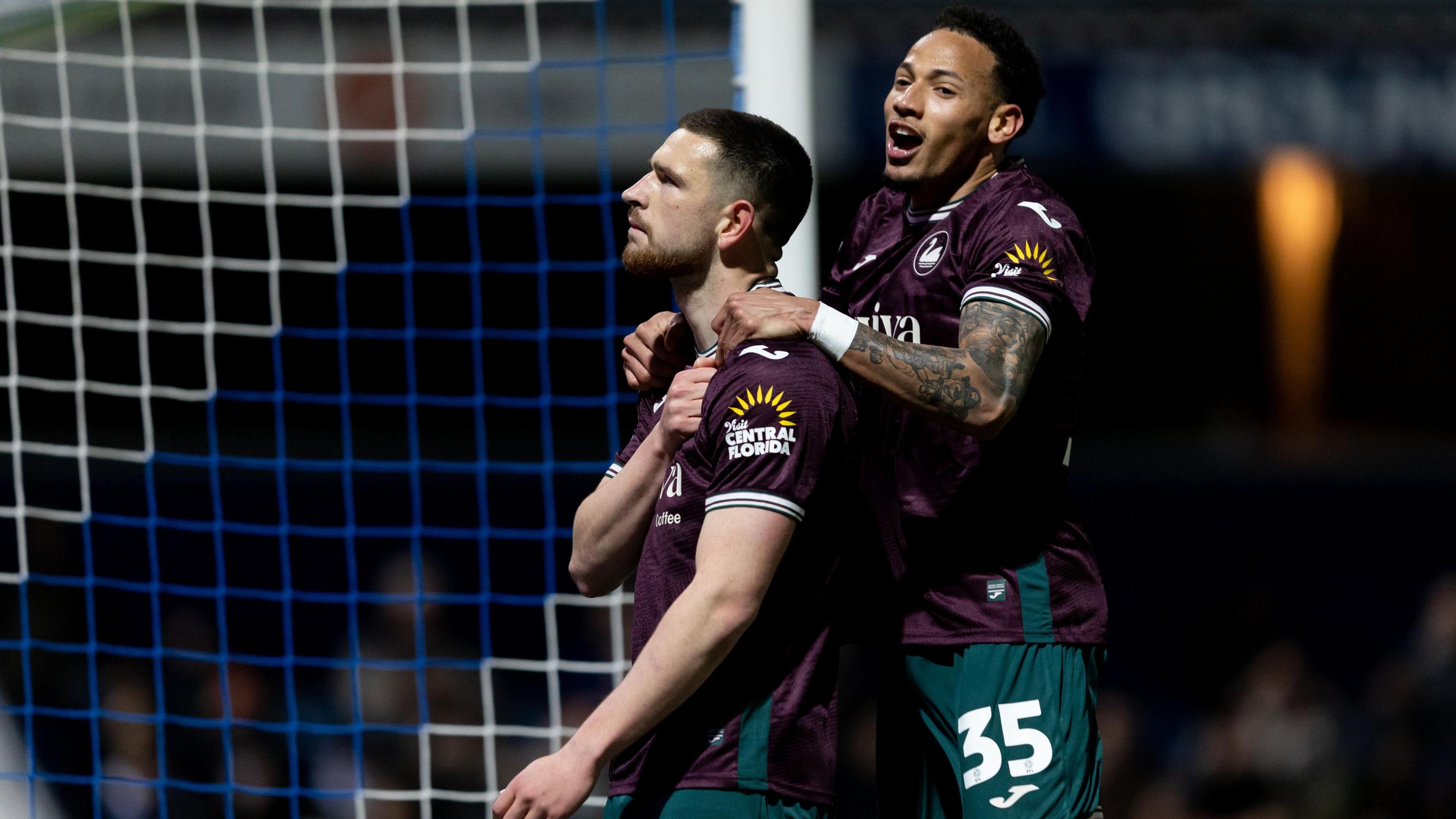 Zan Vipotnik celebrates with Ronald 