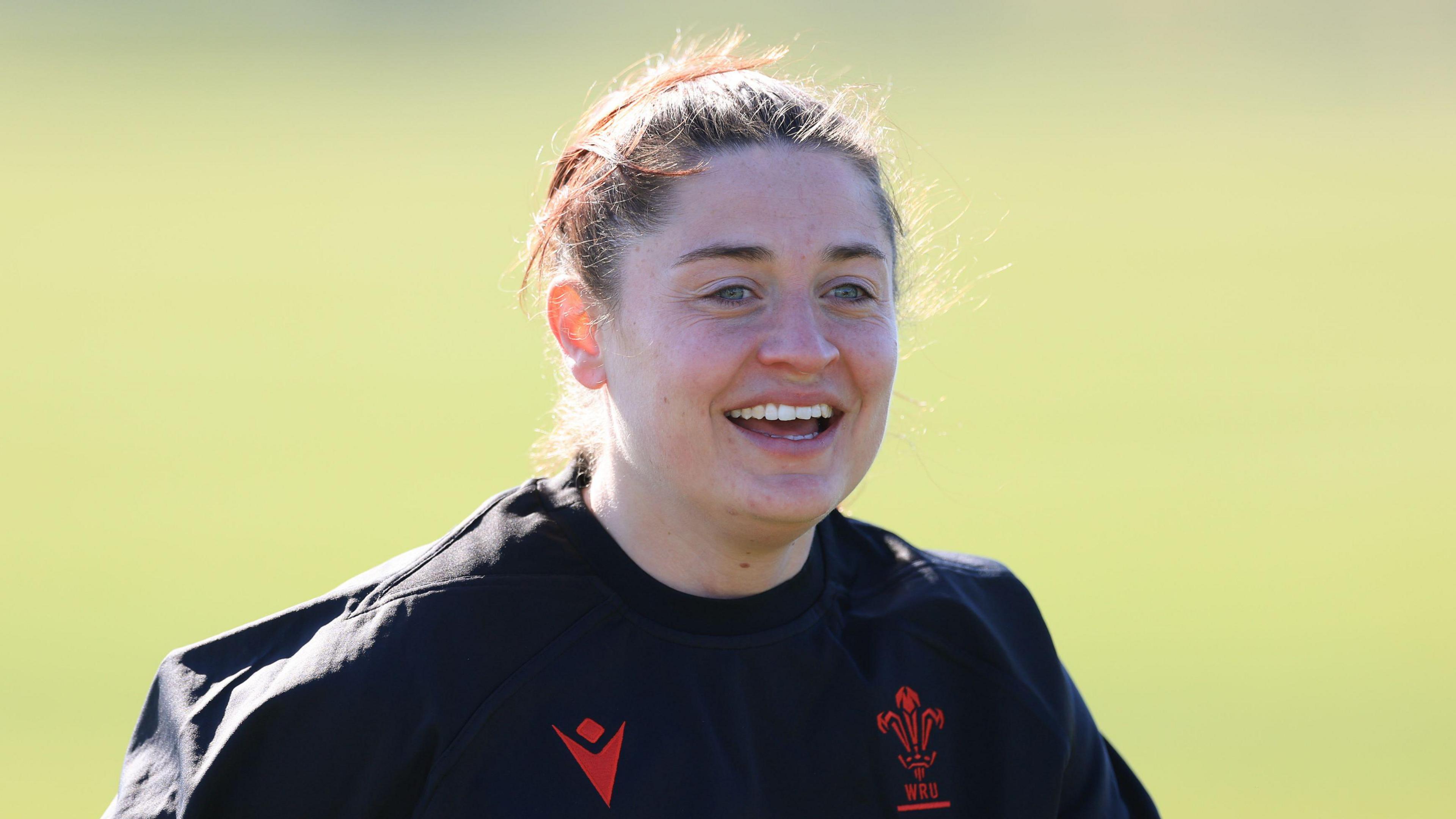 Robyn Wilkins smiles in Wales training 