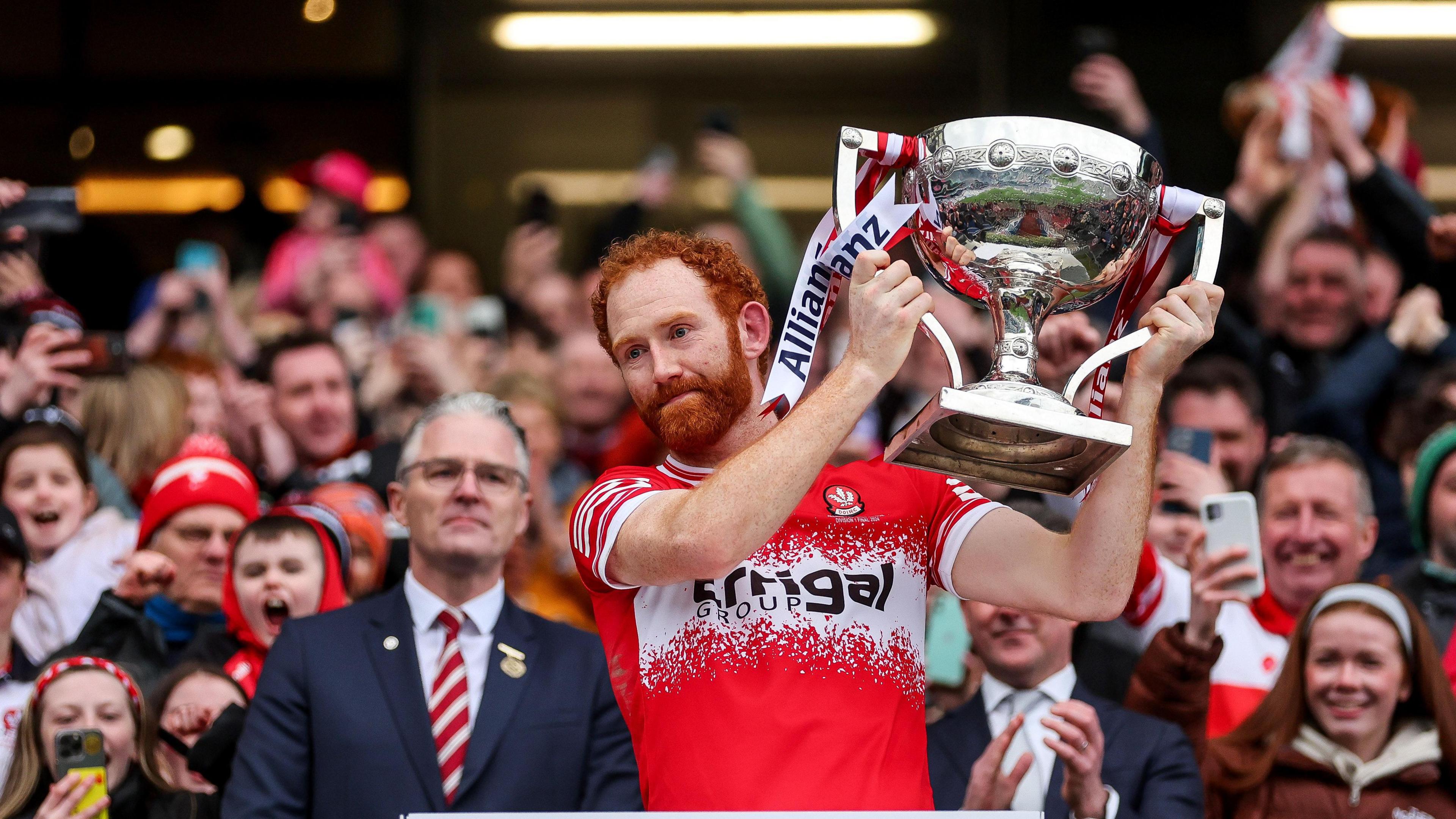Conor Glass the Derry captain lifts the National Football League Division One title