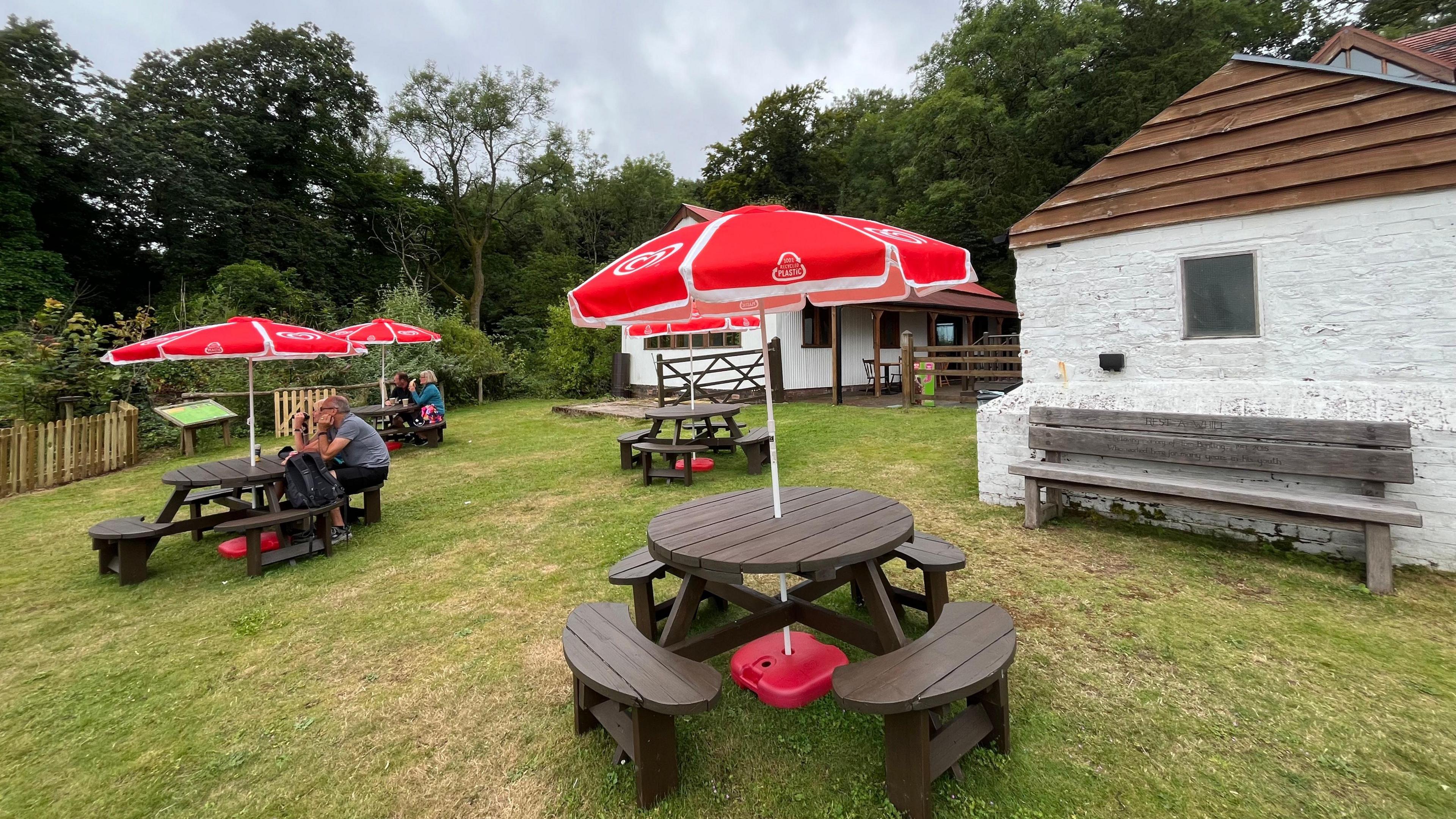 General view of picnic benches outside the Halfway House cafe